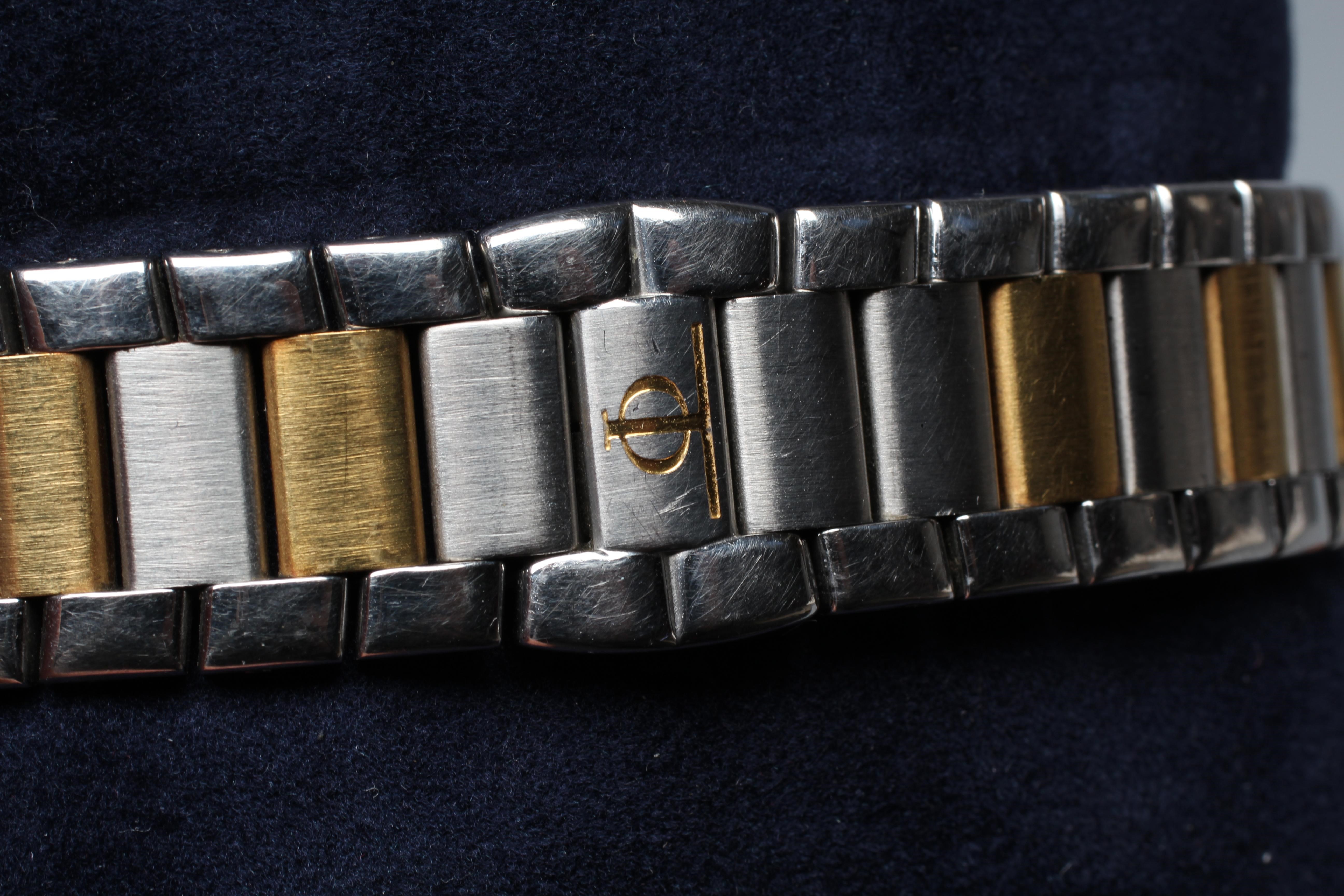 A GENTLEMAN'S BAUME & MERCIER STAINLESS TRIPLE CALENDAR WRISTWATCH Image