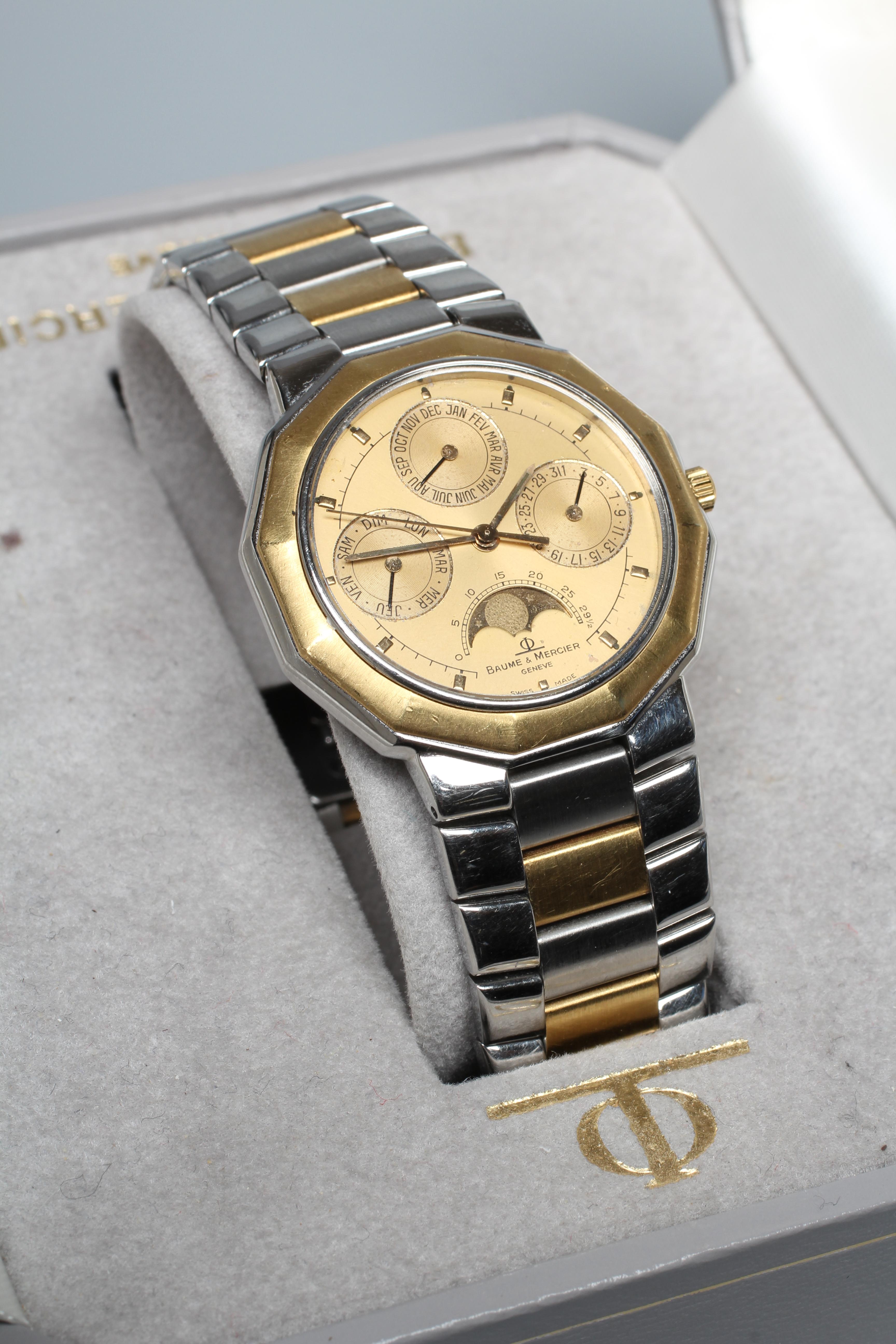A GENTLEMAN'S BAUME & MERCIER STAINLESS TRIPLE CALENDAR WRISTWATCH Image