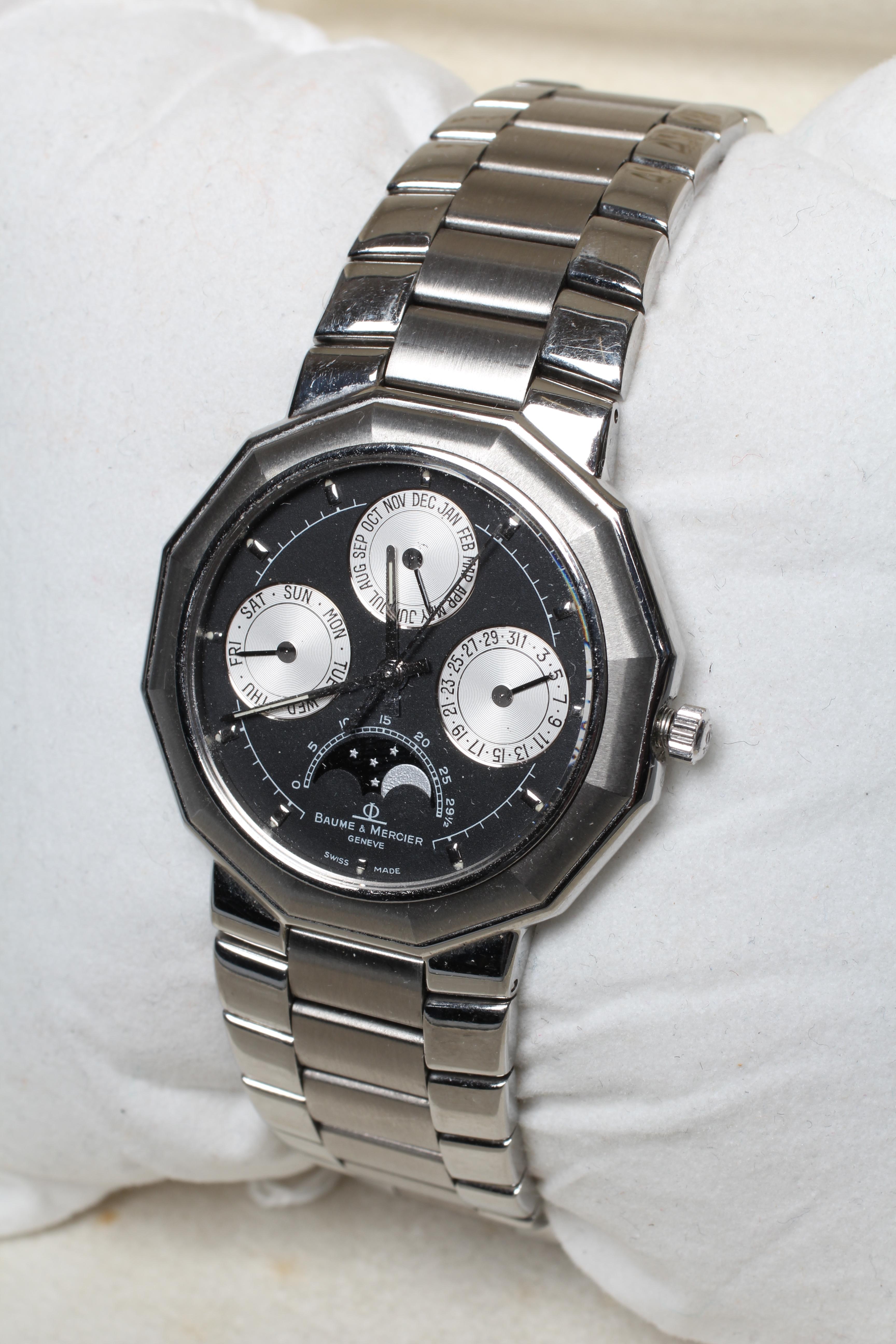 A GENTLEMAN'S BAUME & MERCIER STAINLESS TRIPLE CALENDAR WRISTWATCH Image