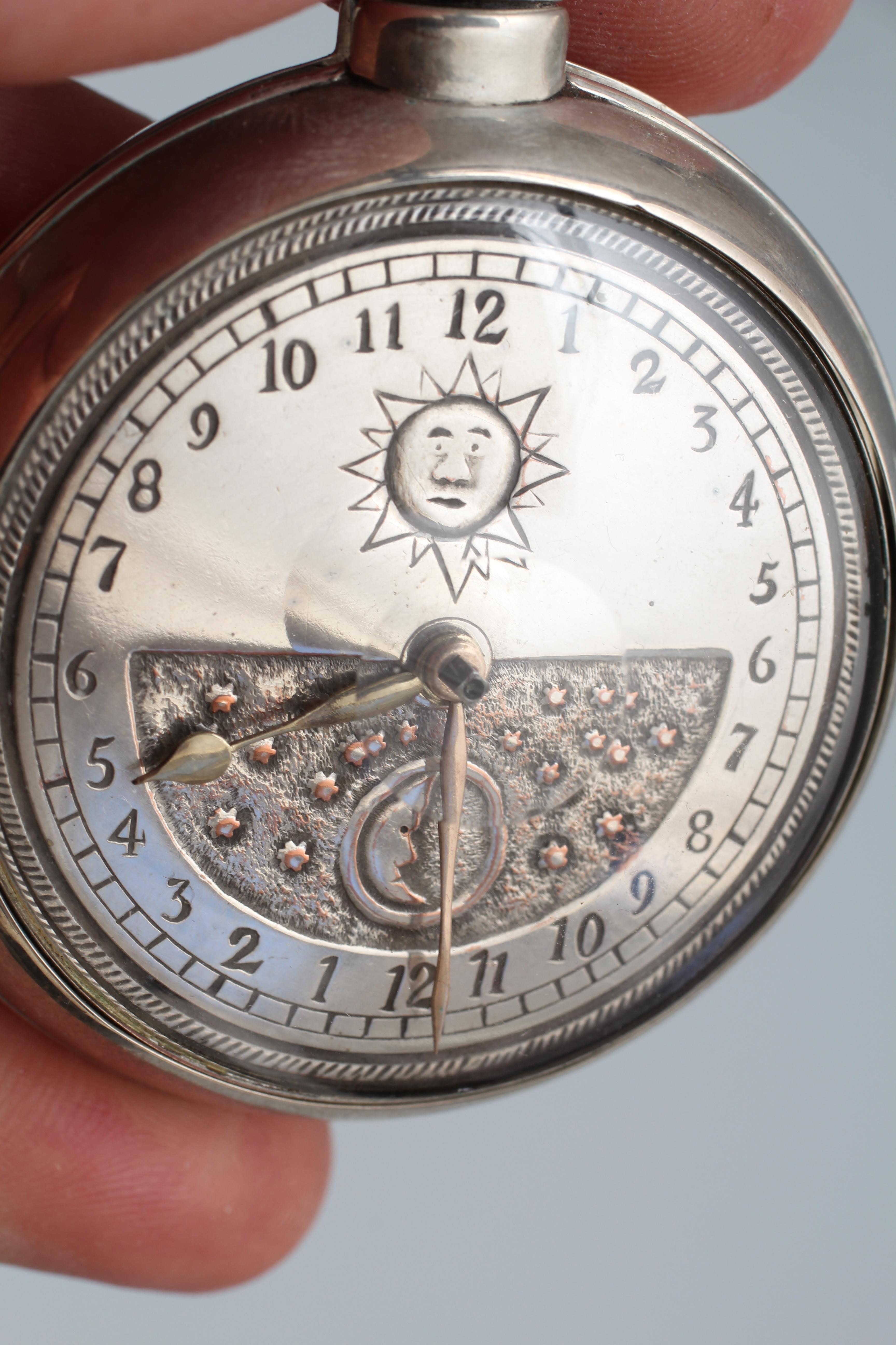 A SILVER PAIR CASED ASTROLOGICAL POCKET WATCH Image