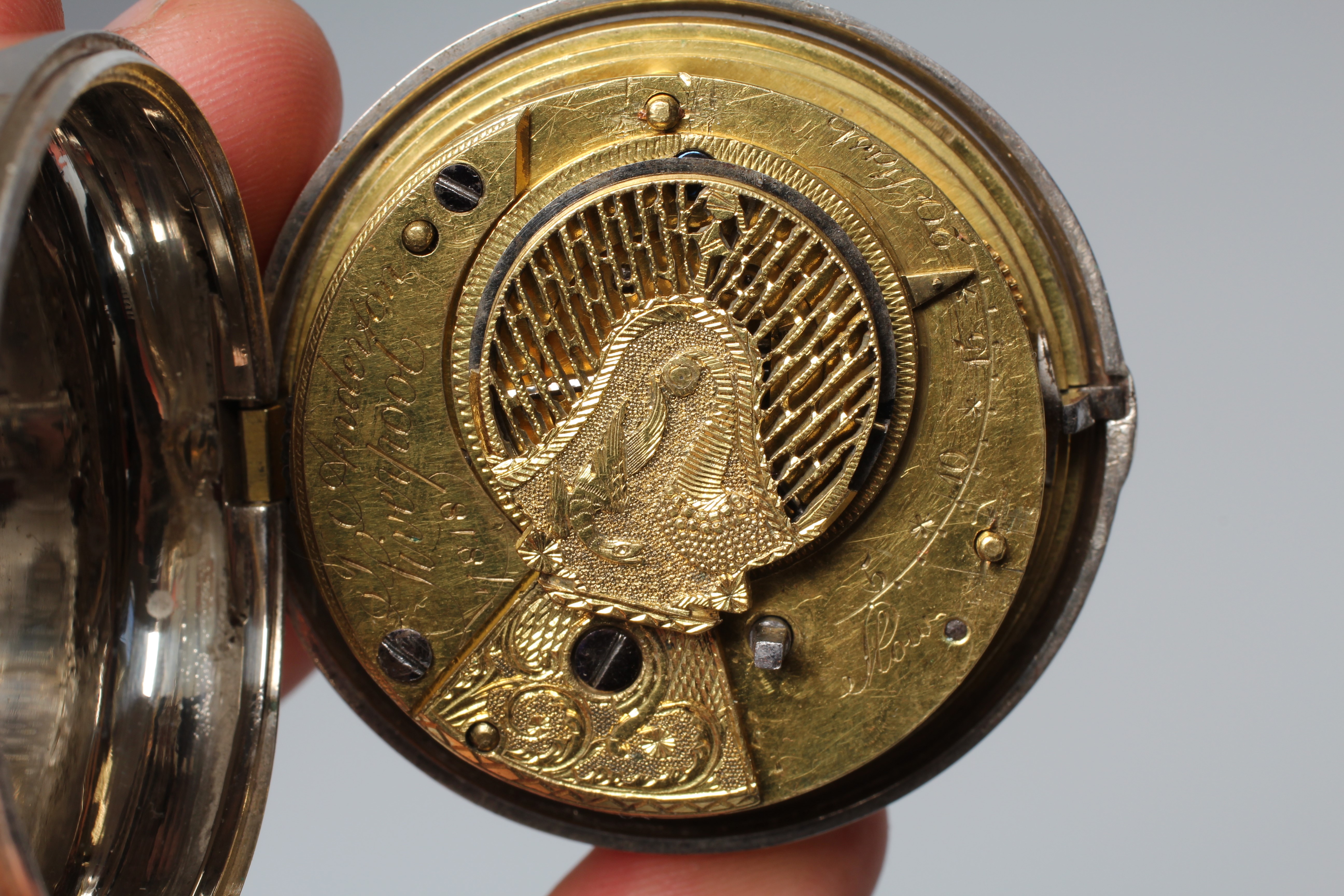 A SILVER PAIR CASED ASTROLOGICAL POCKET WATCH Image