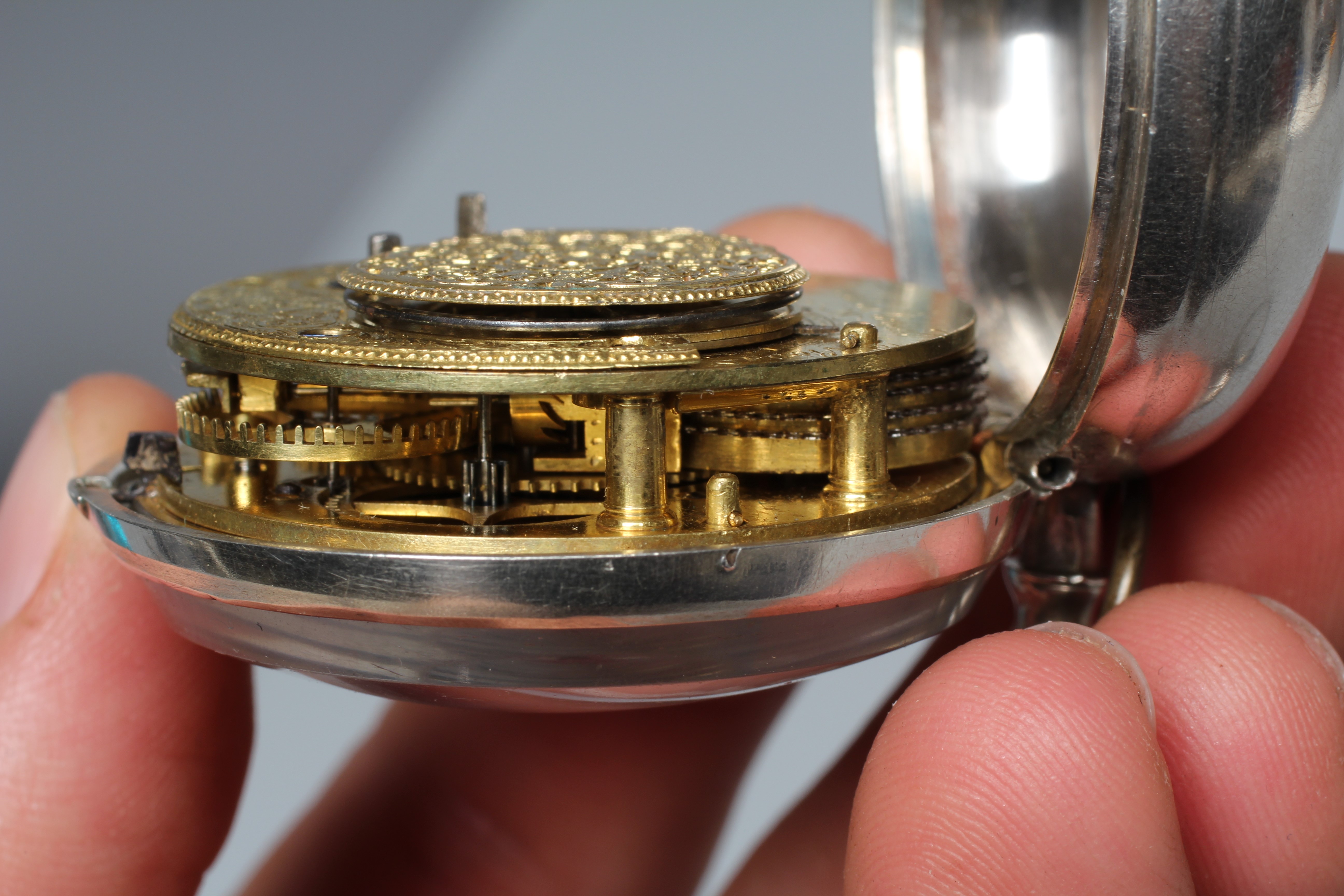 A SILVER PAIR CASED POCKET WATCH Image