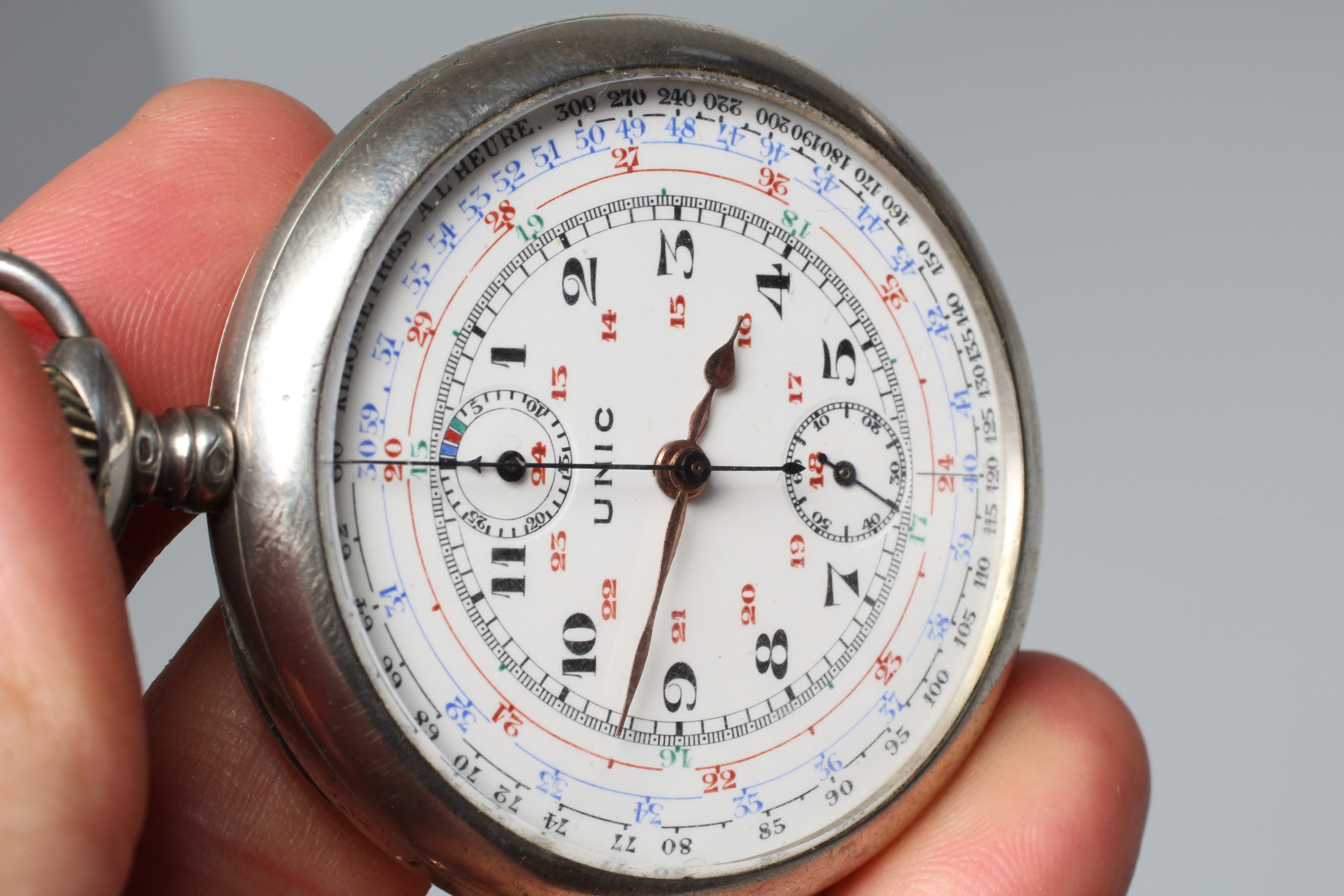 A FOUR COLOUR CODED CHRONOGRAPH Image