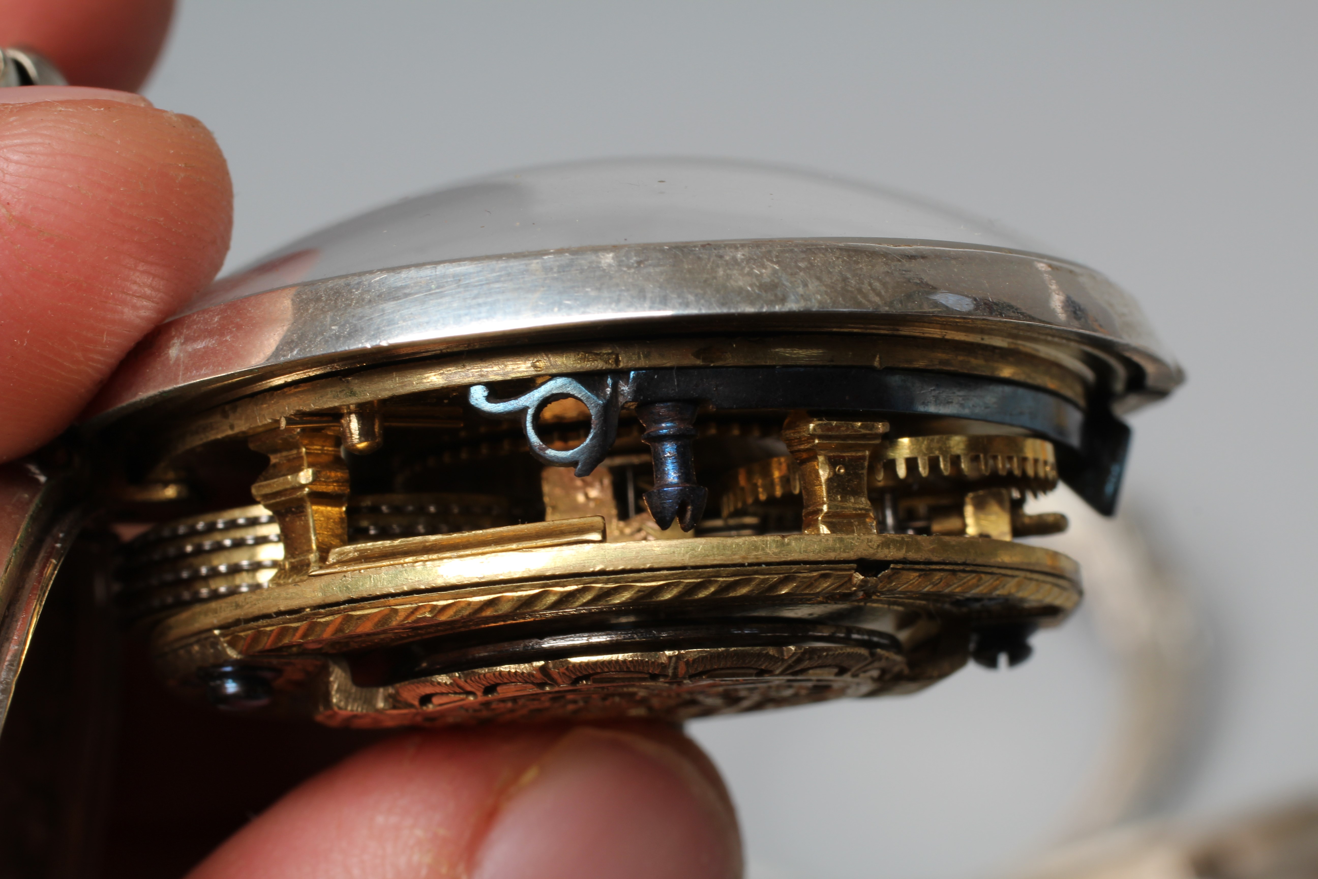 A LATE GEORGE III SILVER PAIR CASED POCKET WATCH Image