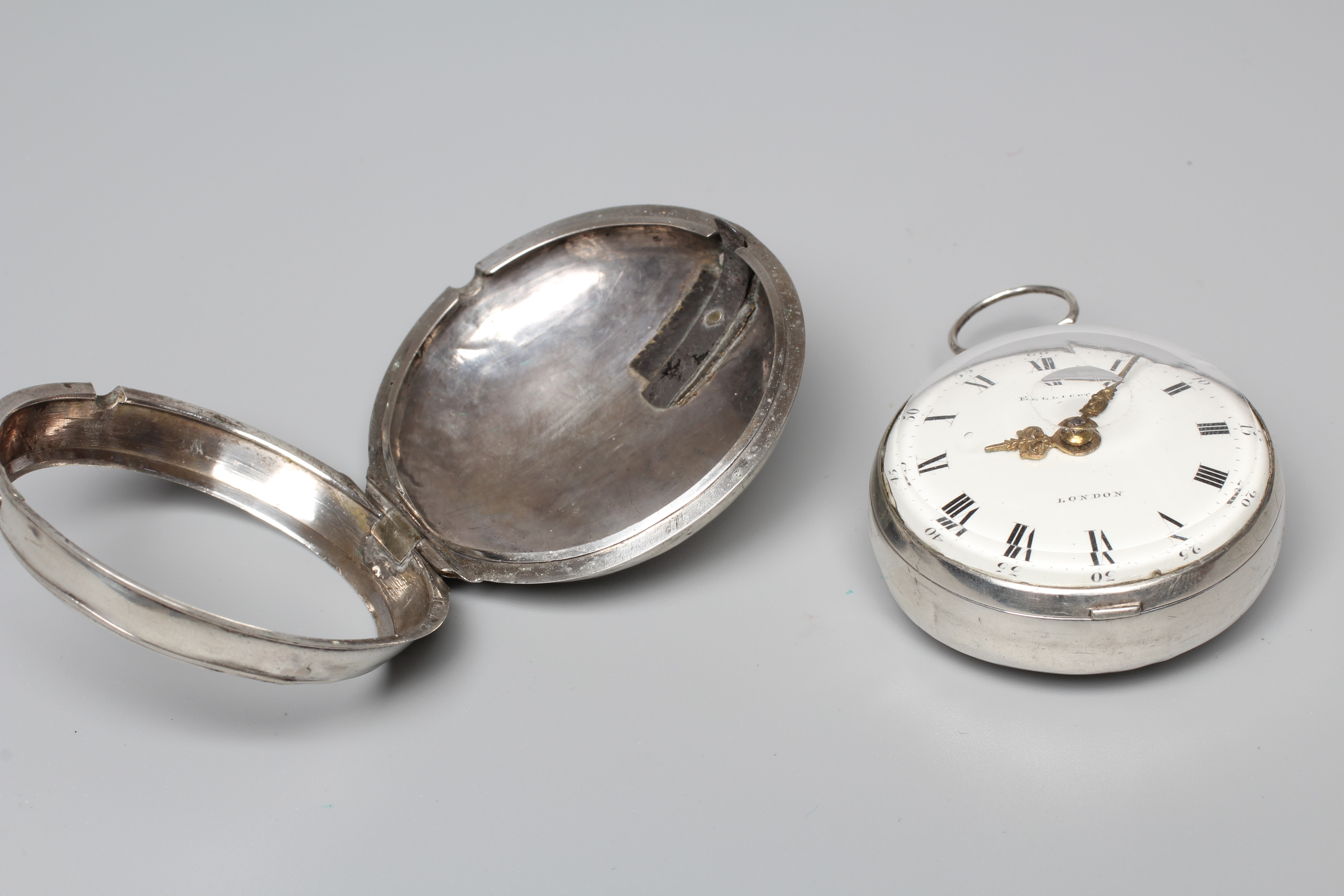 A SILVER PAIR CASED POCKET WATCH Image