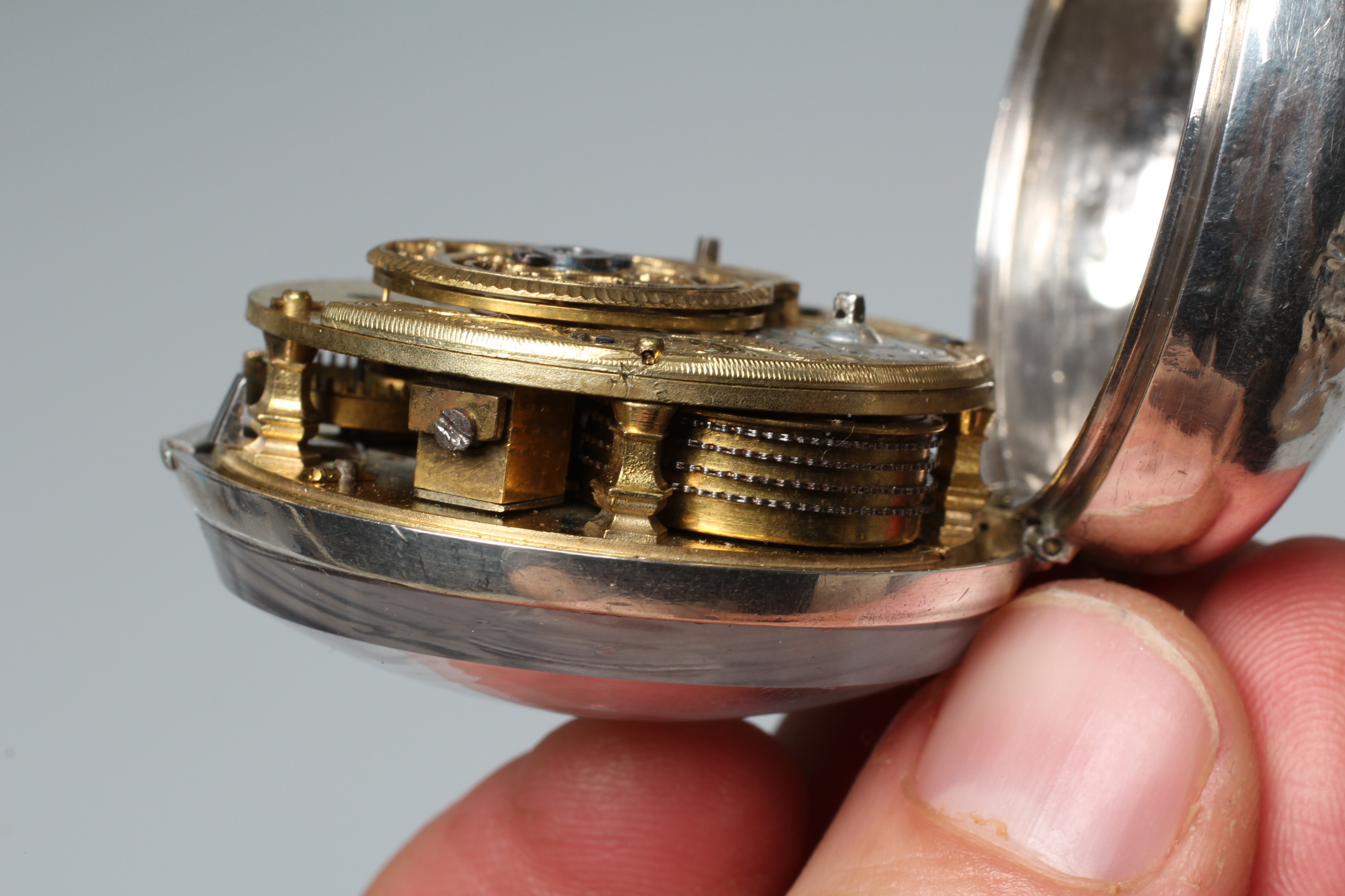 A SILVER PAIR CASED POCKET WATCH Image