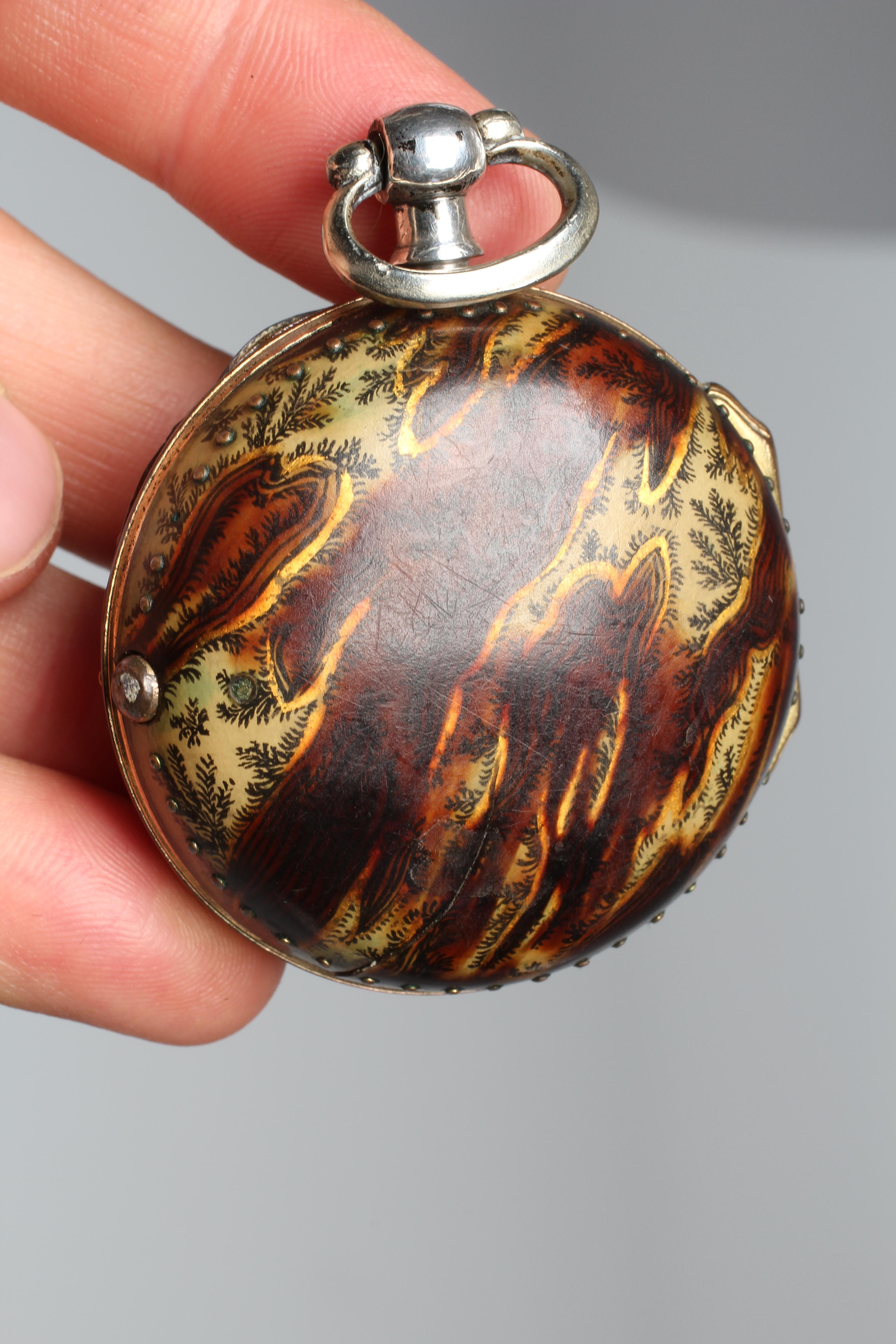 A LATE GEORGE III SILVER AND TORTOISESHELL PAIR CASED POCKET WATCH Image
