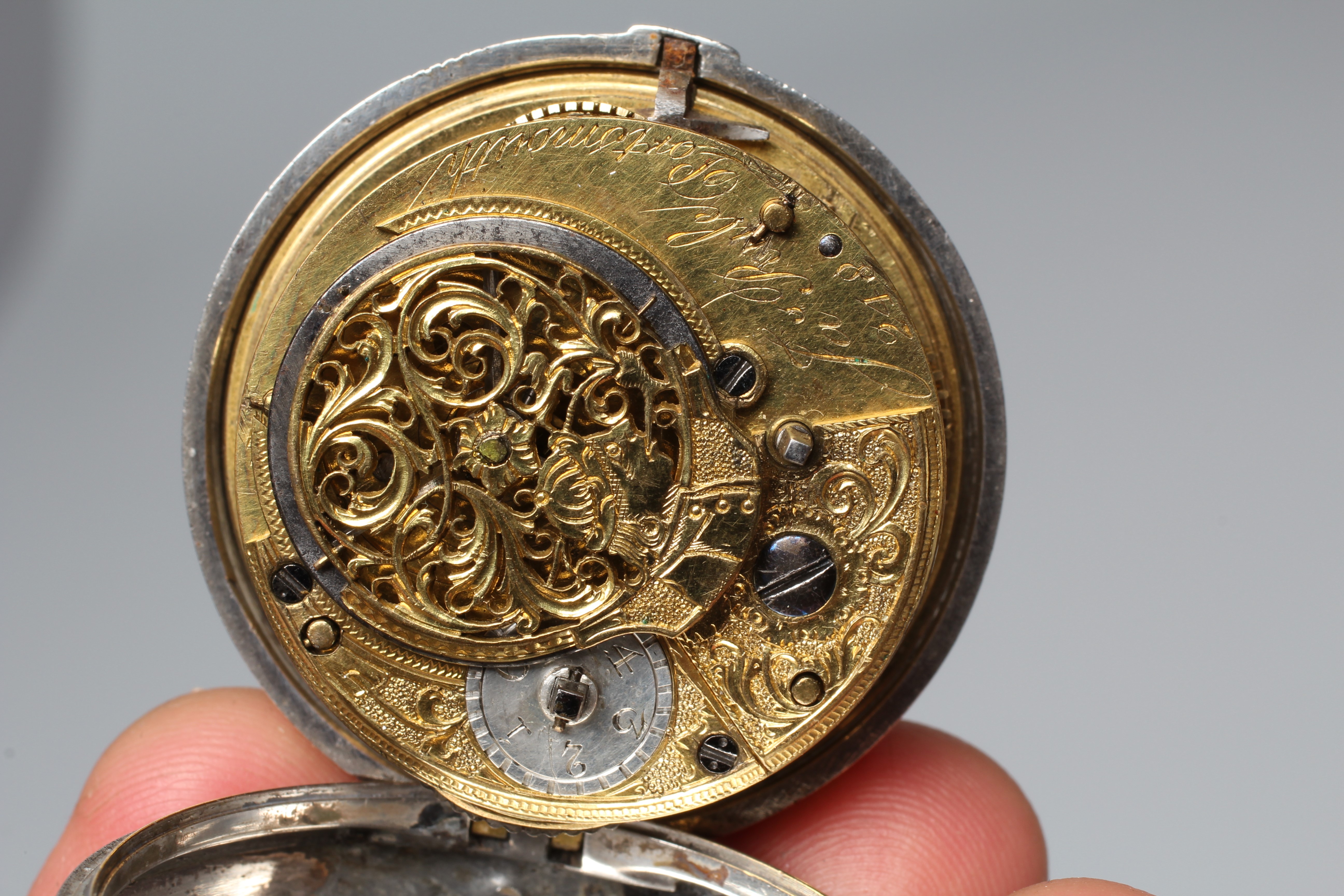A LATE GEORGE III SILVER AND TORTOISESHELL PAIR CASED POCKET WATCH Image