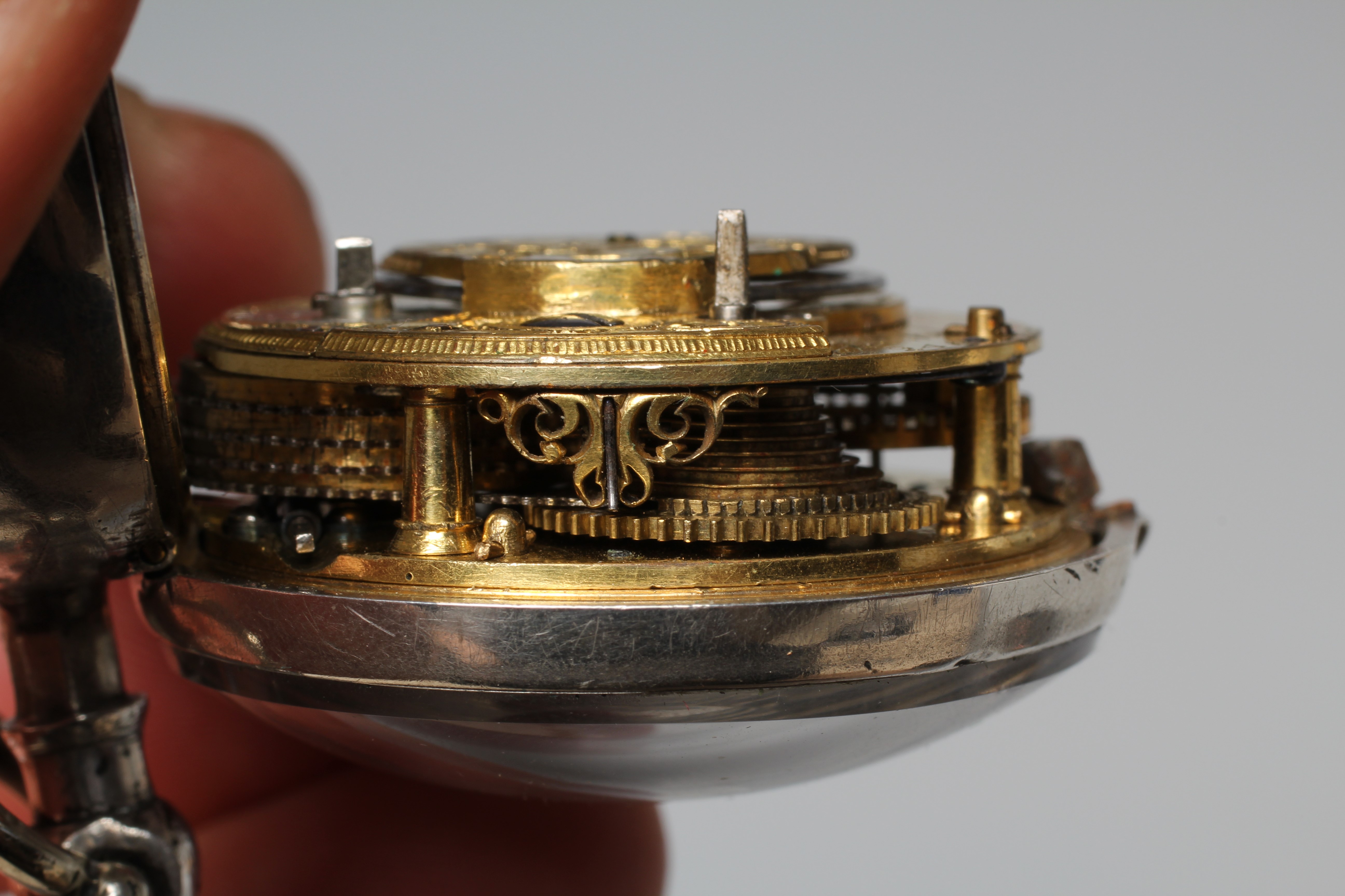 A LATE GEORGE III SILVER AND TORTOISESHELL PAIR CASED POCKET WATCH Image