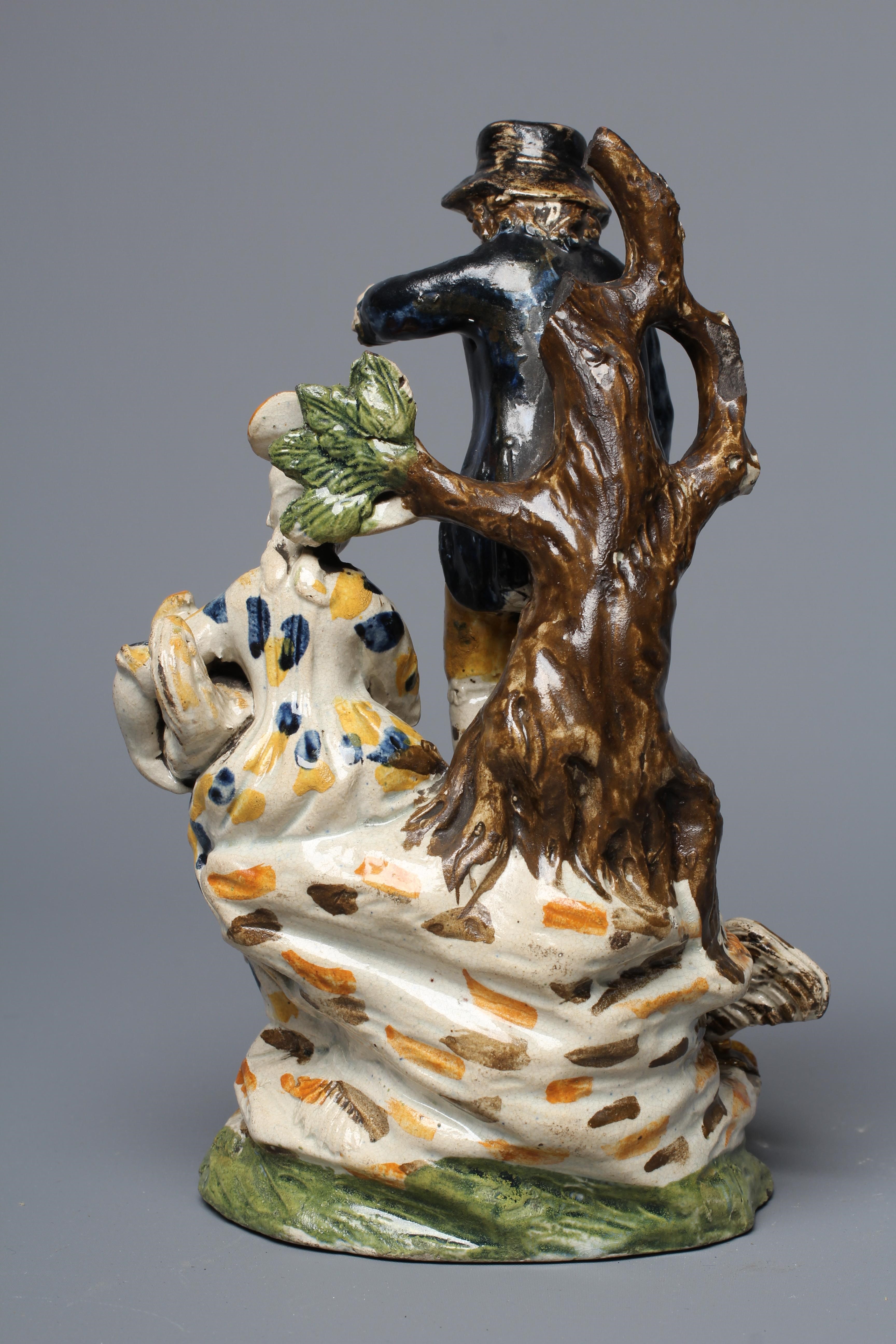 A STAFFORDSHIRE POTTERY COCKFIGHTING GROUP Image