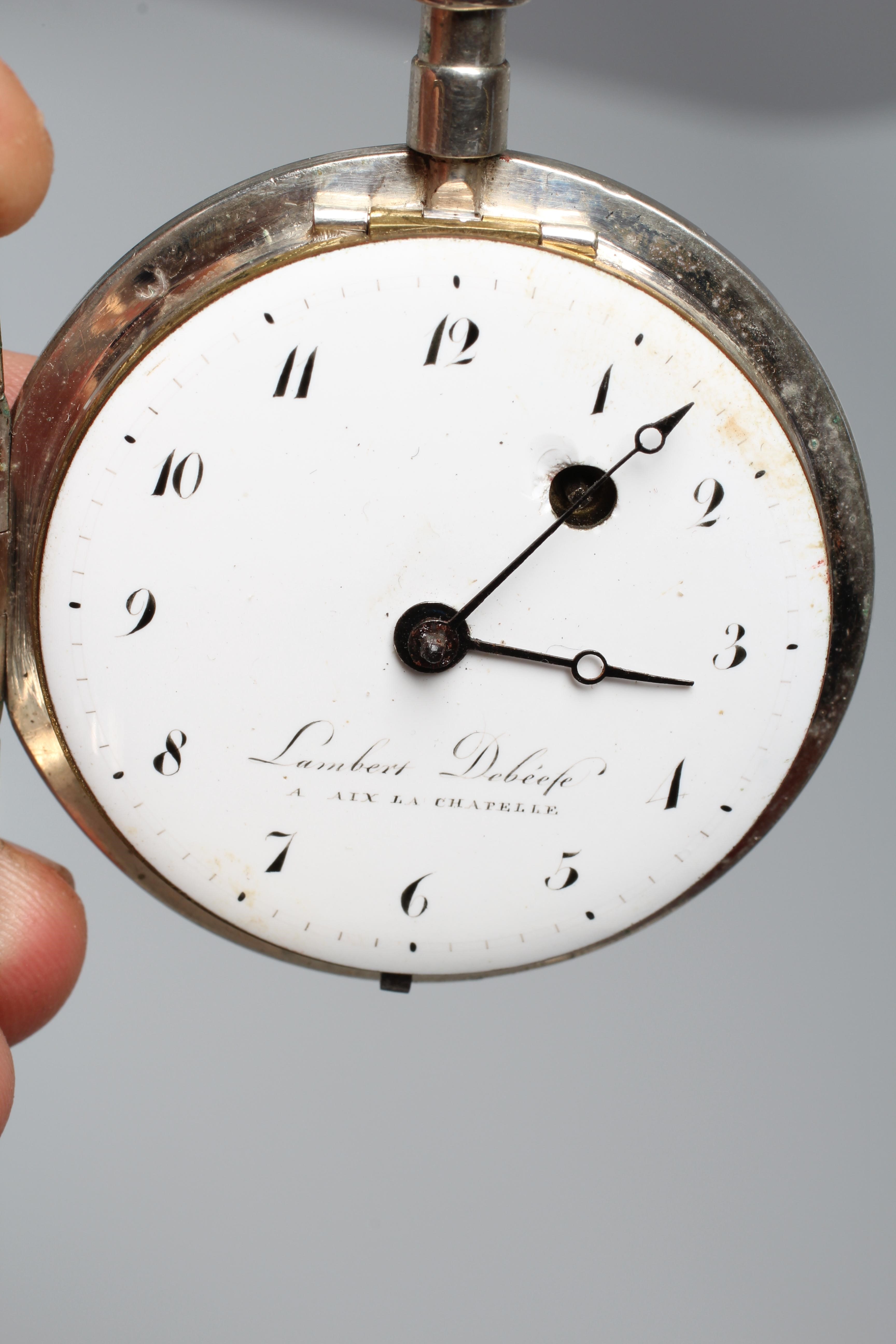 A POCKET WATCH BY LAMBERT DEBEEFE, the white dial with black Arabic numerals, winding hole at 2, Image