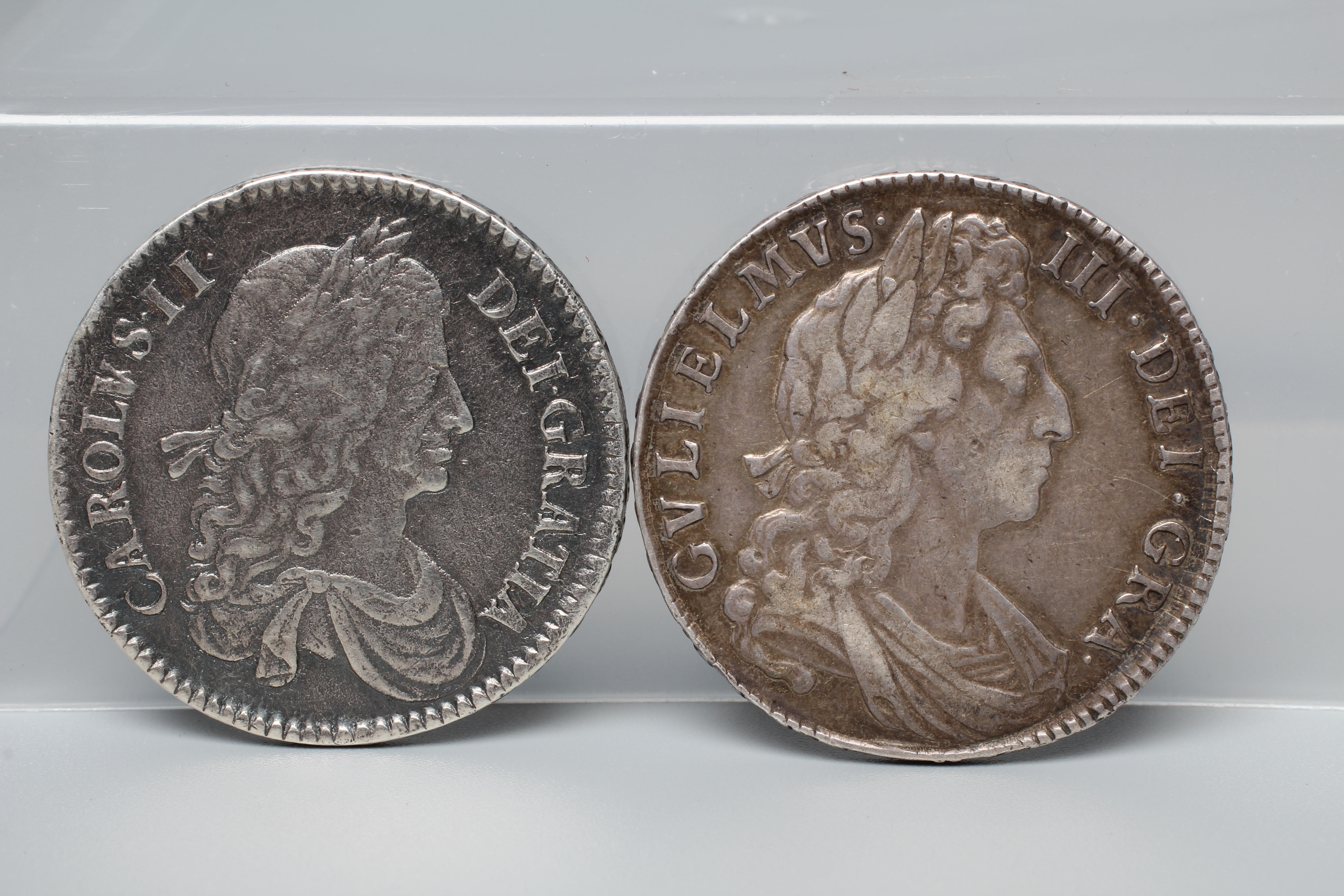 TWO 17TH CENTURY BRITISH HALF CROWNS, comprising a 1663 Charles II and a 1698 William III, both with Image