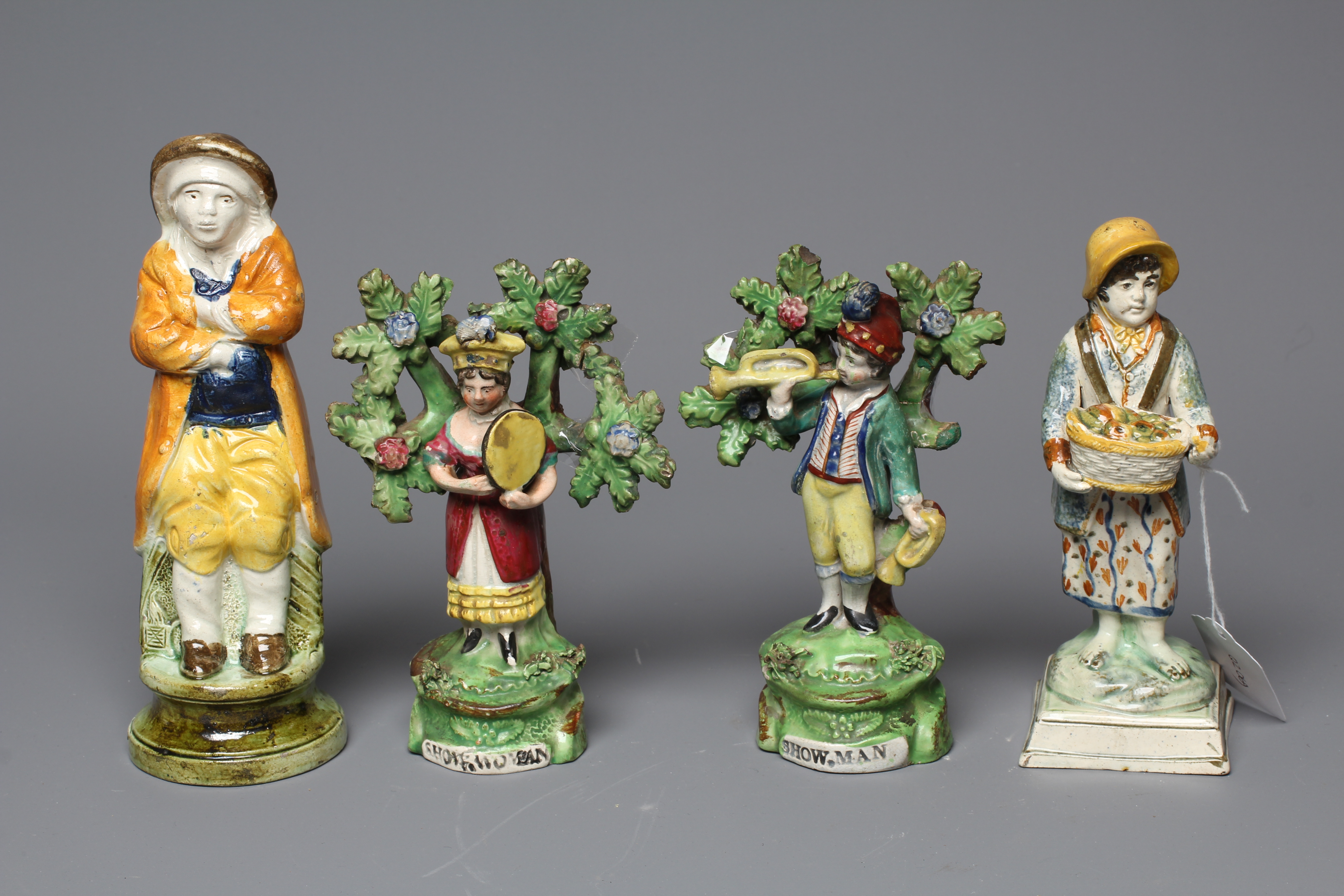 A PAIR OF RALPH SALT TYPE TITLED FIGURES OF SHOW MAN AND SHOW WOMAN Image