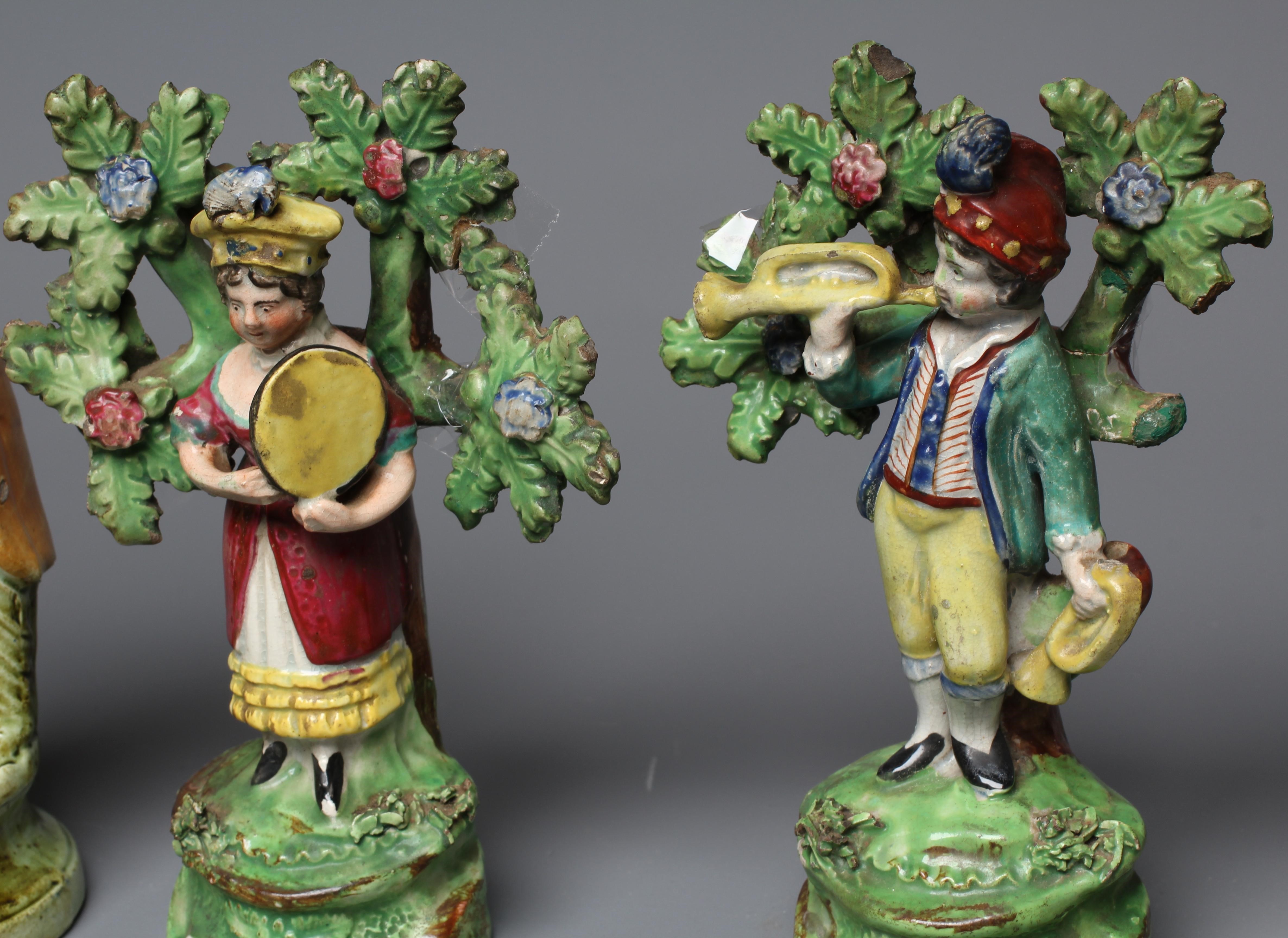 A PAIR OF RALPH SALT TYPE TITLED FIGURES OF SHOW MAN AND SHOW WOMAN Image