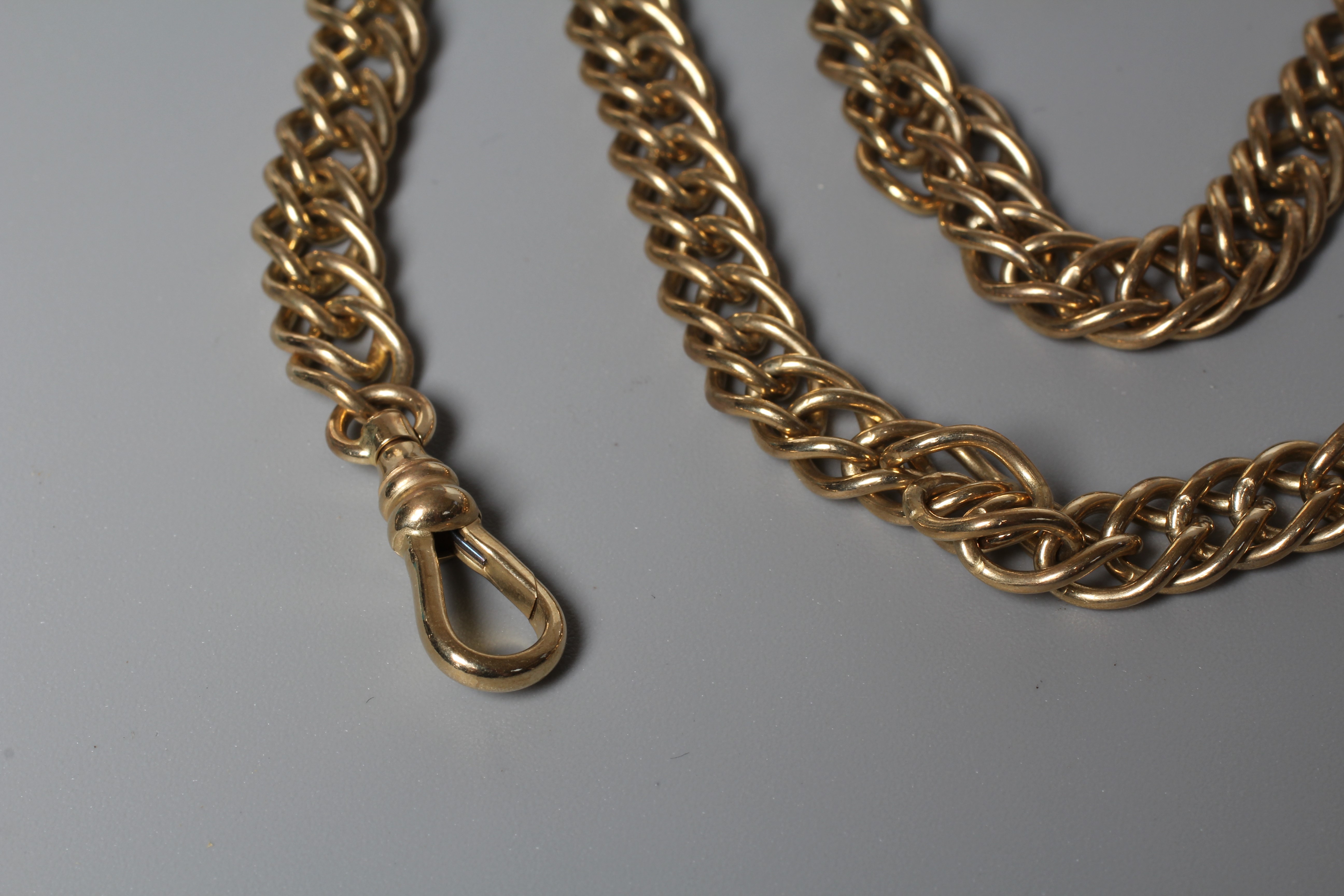 A DOUBLE CURB LINK ALBERT CHAIN with dog-clip fastener stamped 9ct and ring stamped 375, 24" long, Image