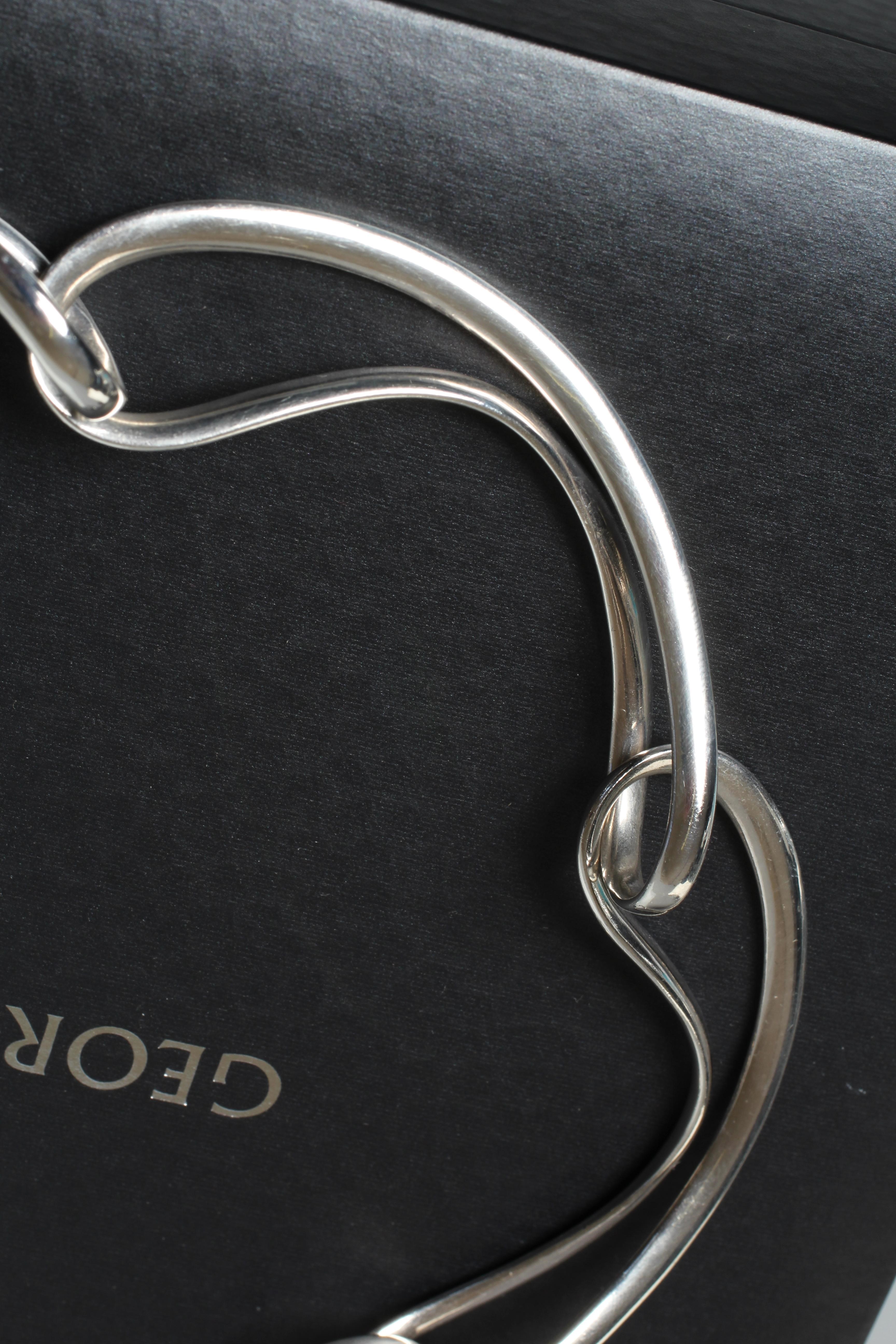 A GEORG JENSEN SILVER INFINITY CHOKER designed by Regitze Overgaard formed of six openwork Image