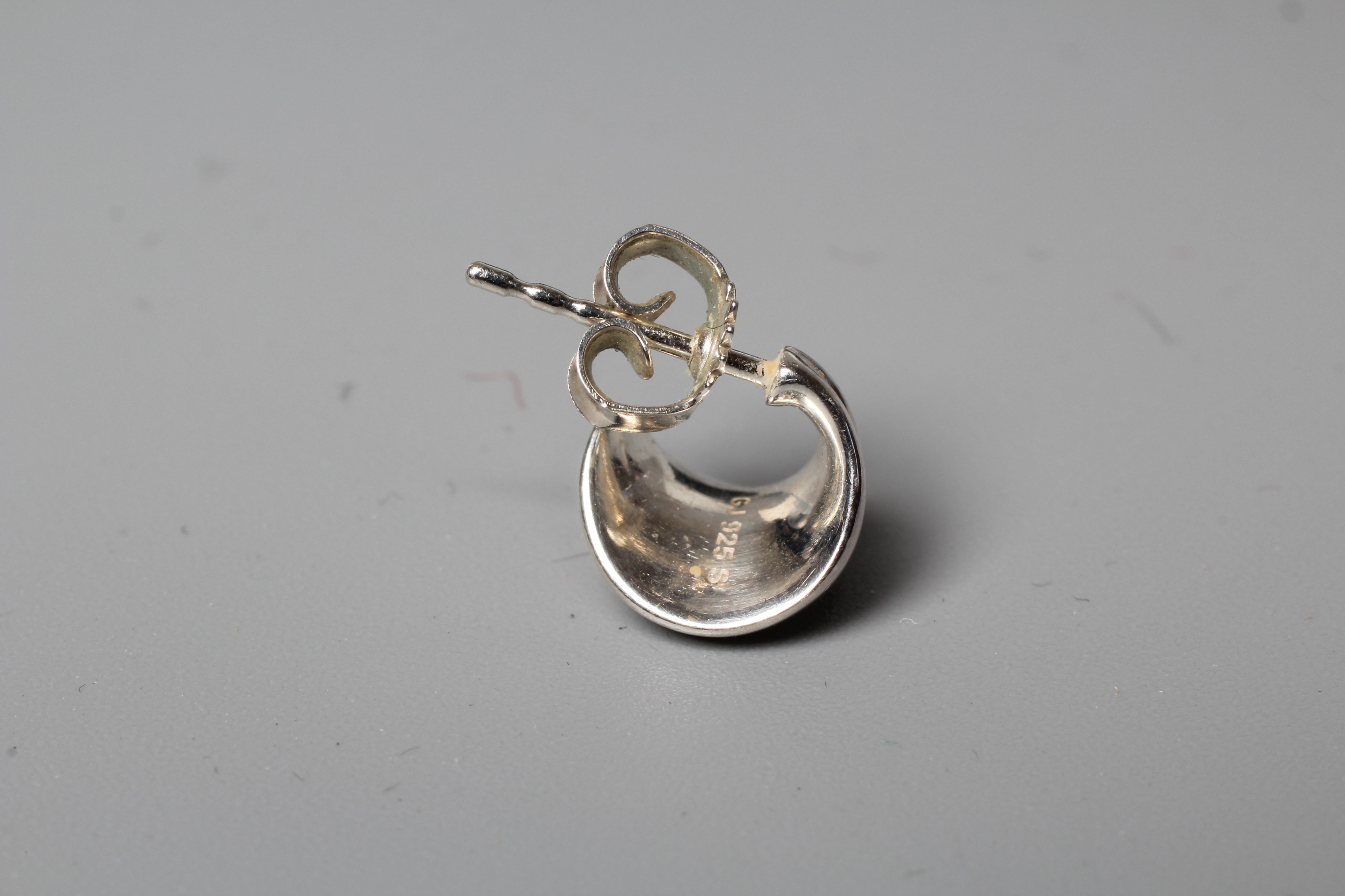 A PAIR OF GEORG JENSEN SILVER EAR STUDS of stylised leaf form, cased and boxed Image