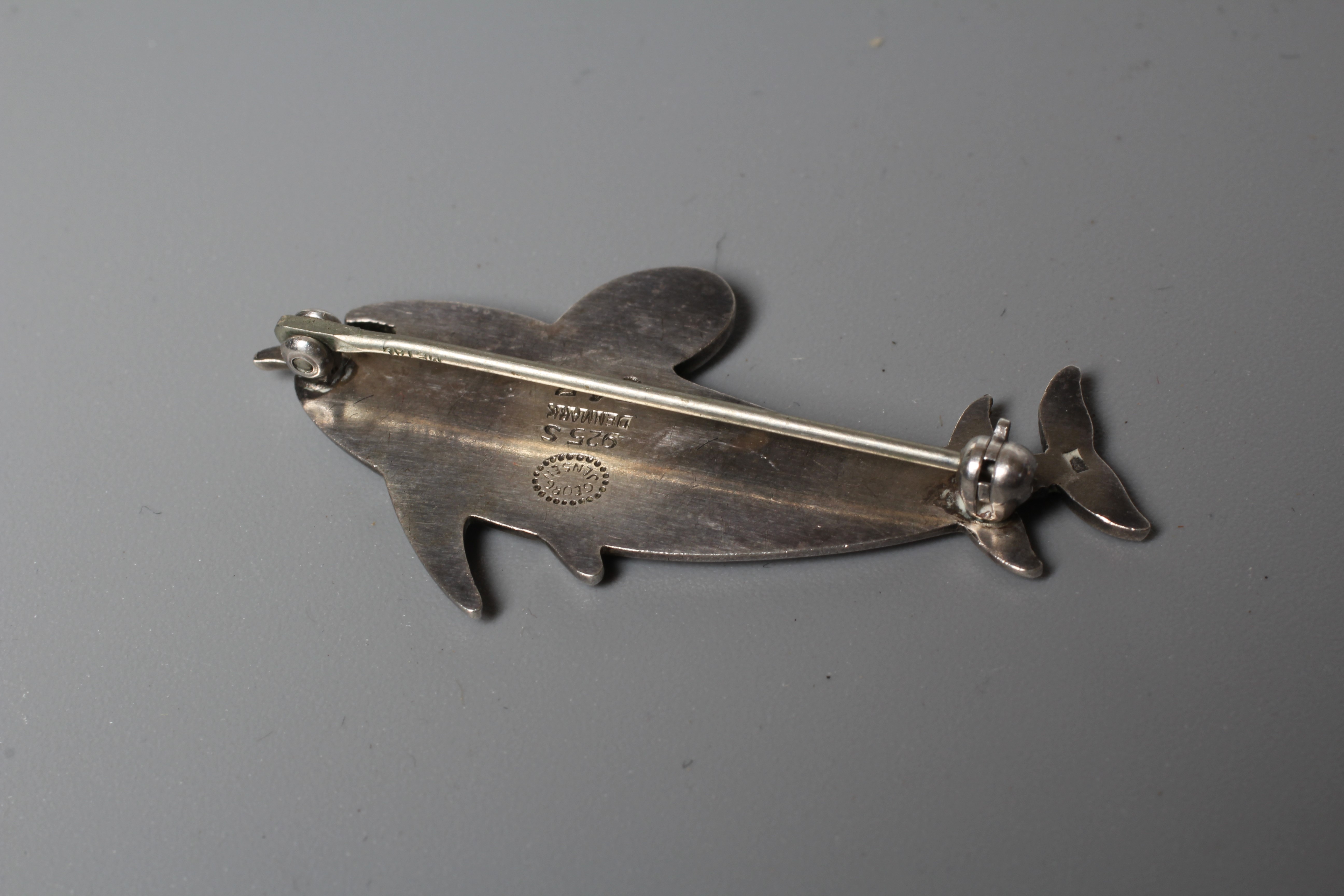 A GEORG JENSEN SILVER DOUBLE DOLPHIN BROOCH designed by Arno Malinowski, stamped and numbered 317 Image