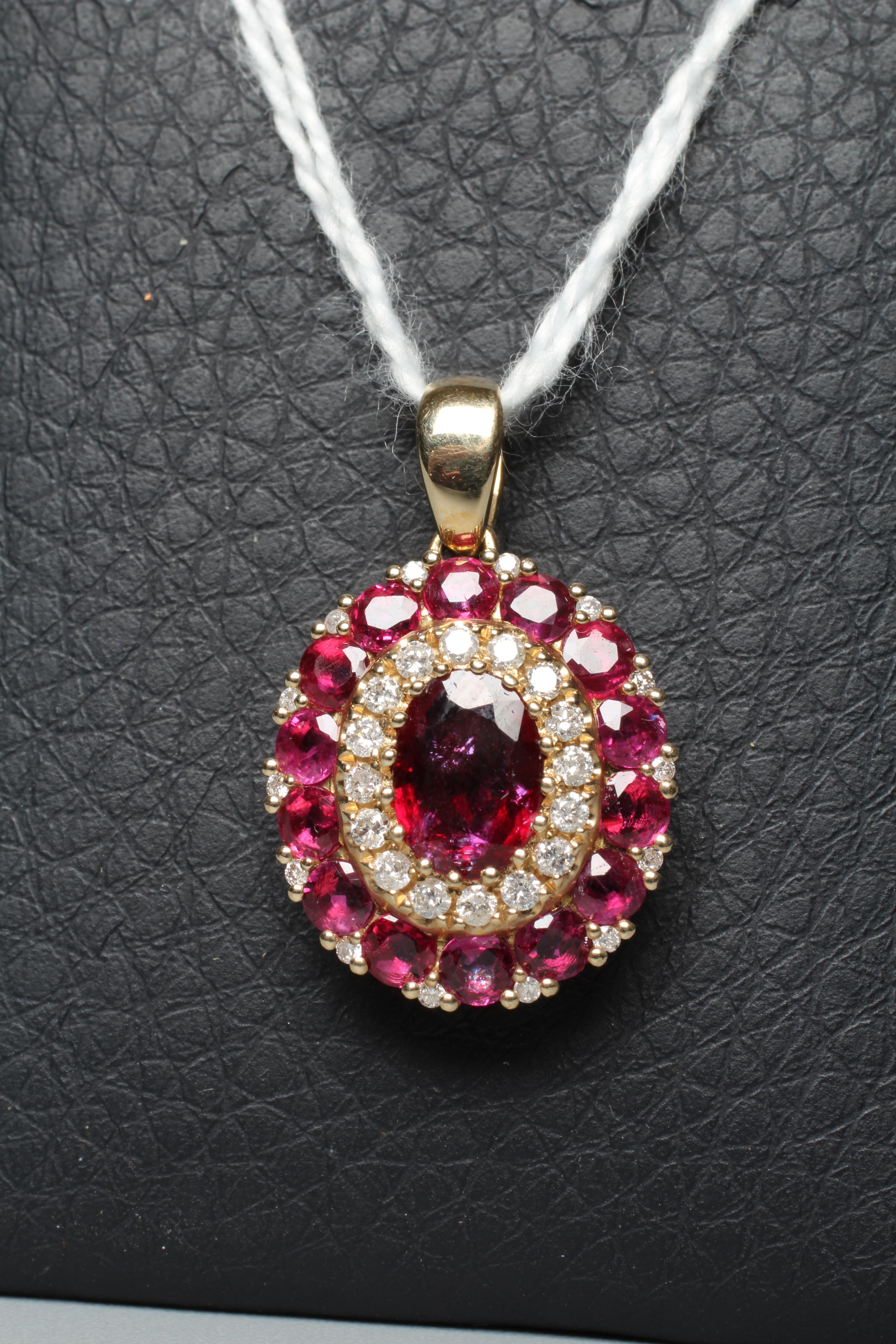 A RUBY AND DIAMOND PENDANT Image
