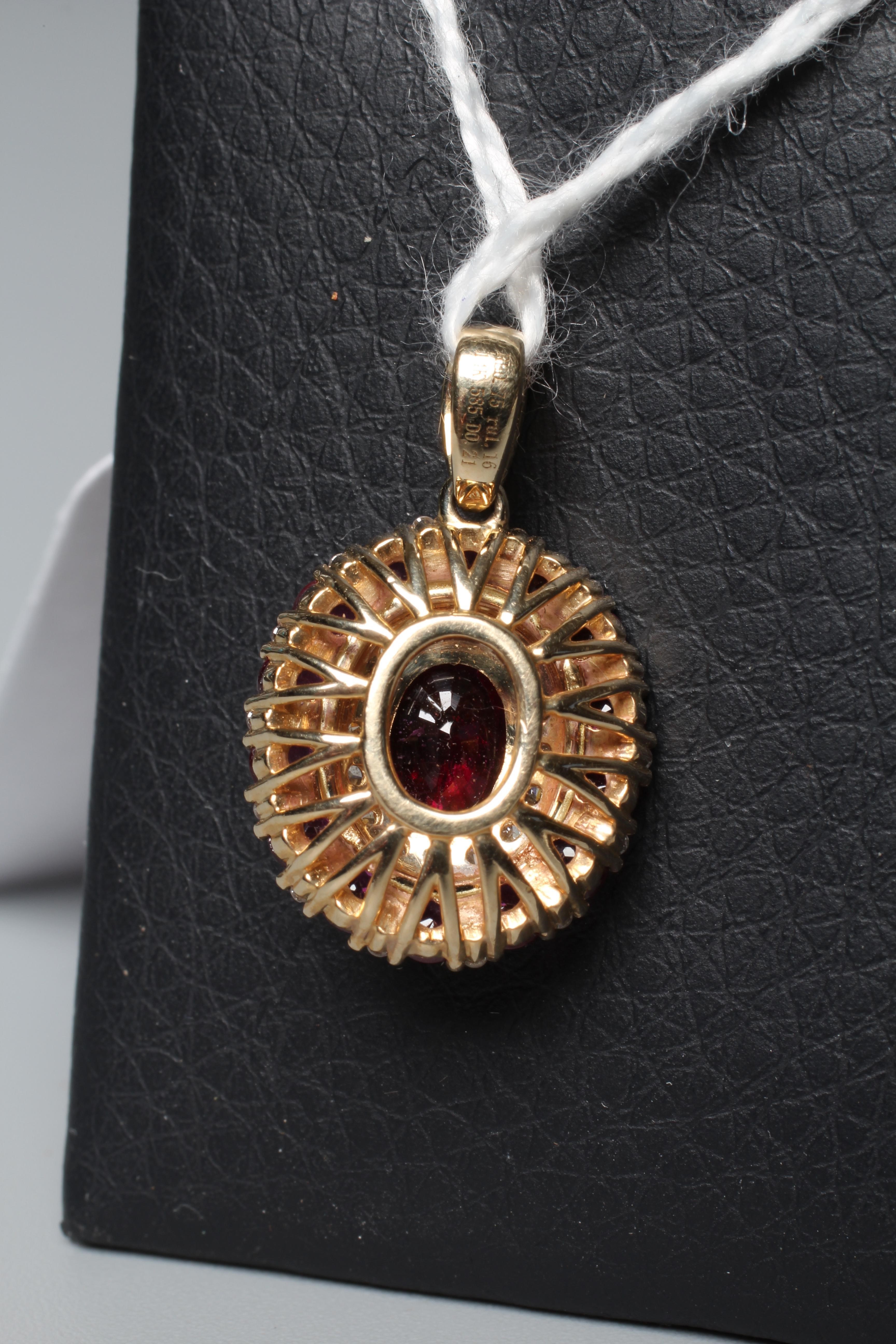 A RUBY AND DIAMOND PENDANT Image