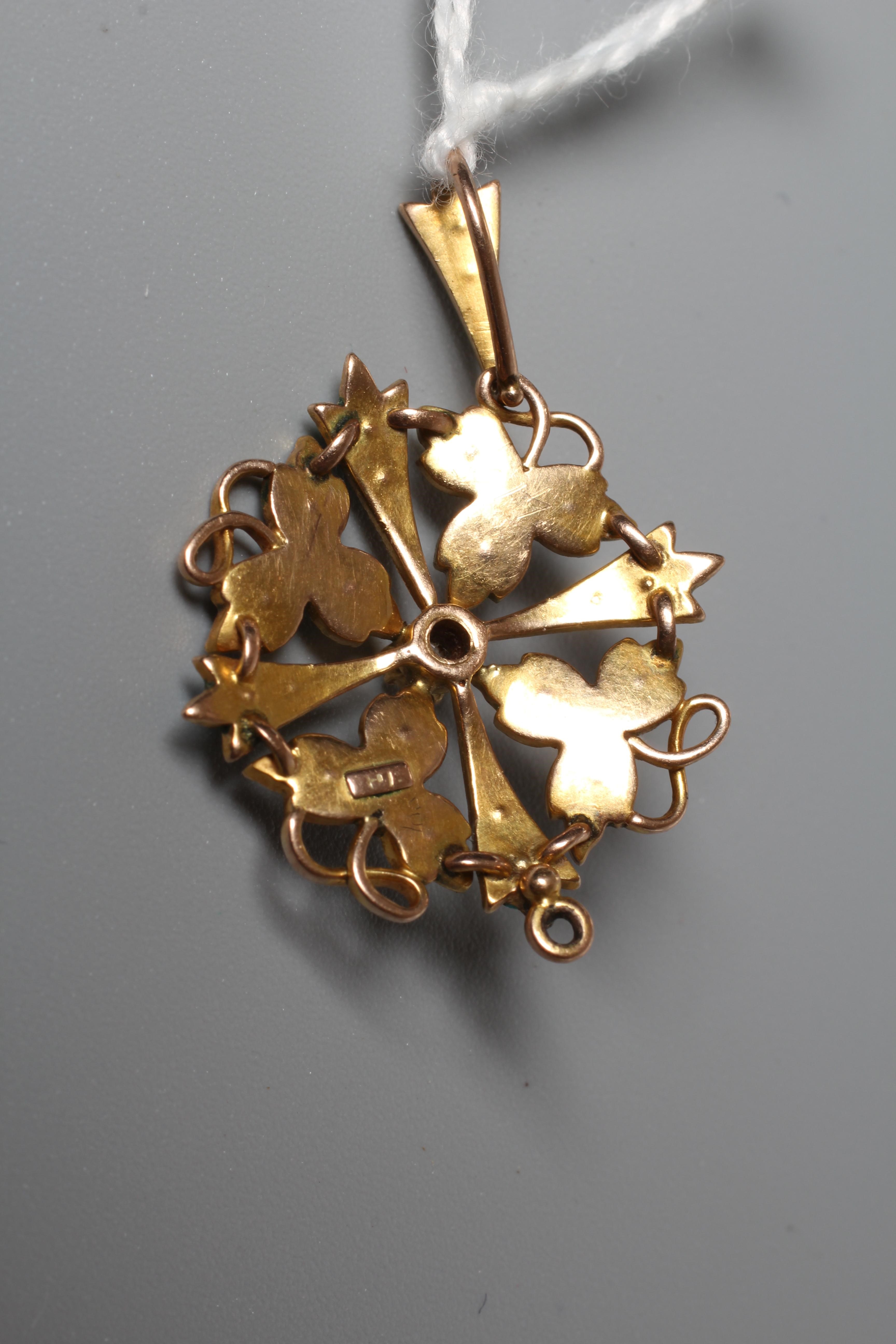 A LATE VICTORIAN TURQUOISE AND SEED PEARL FLOWER PENDANT, applied plaque stamped 9ct Image