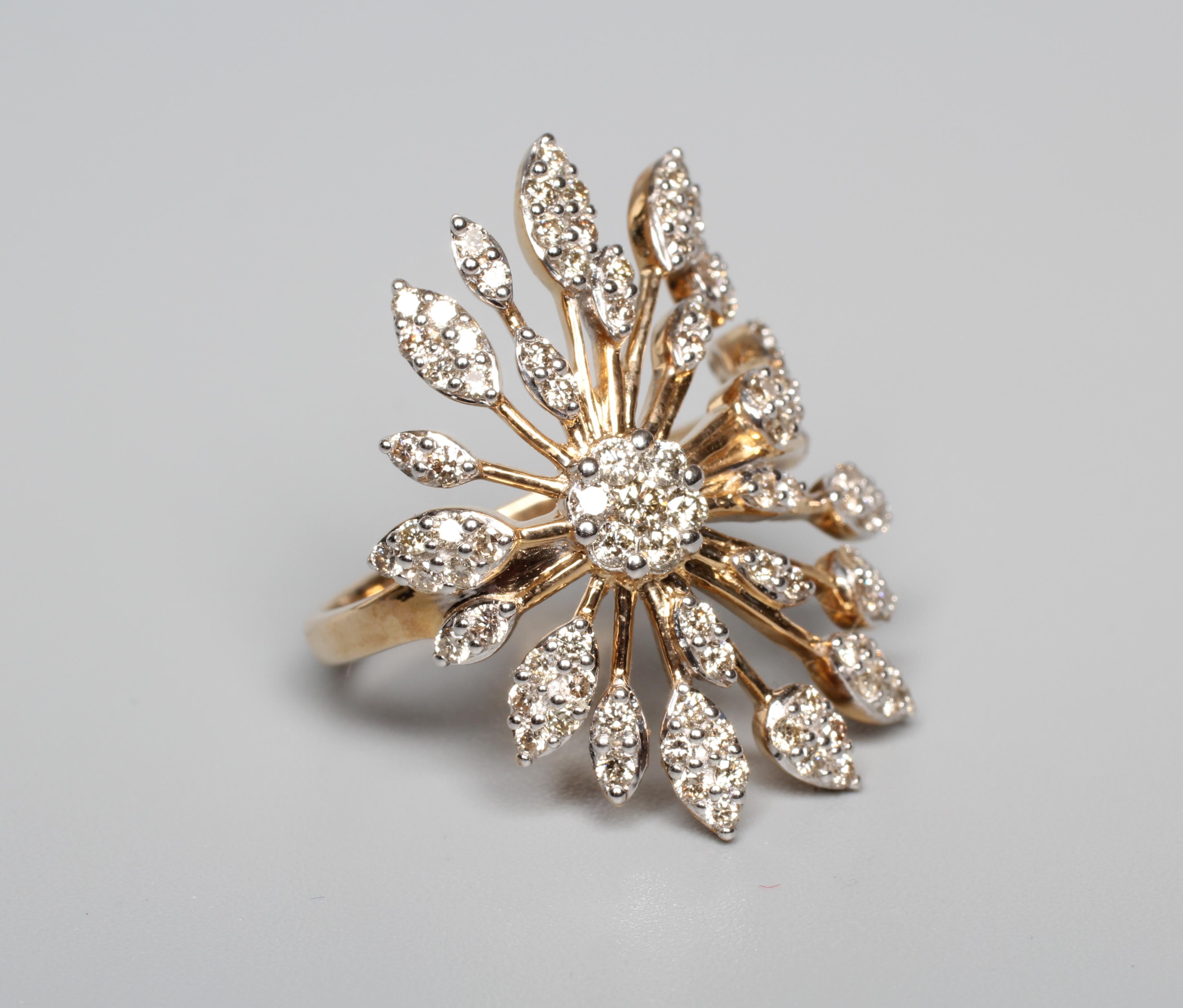 A DIAMOND STAR BURST RING, the round brilliants point set to a rose gold frame and plain shank, size Image