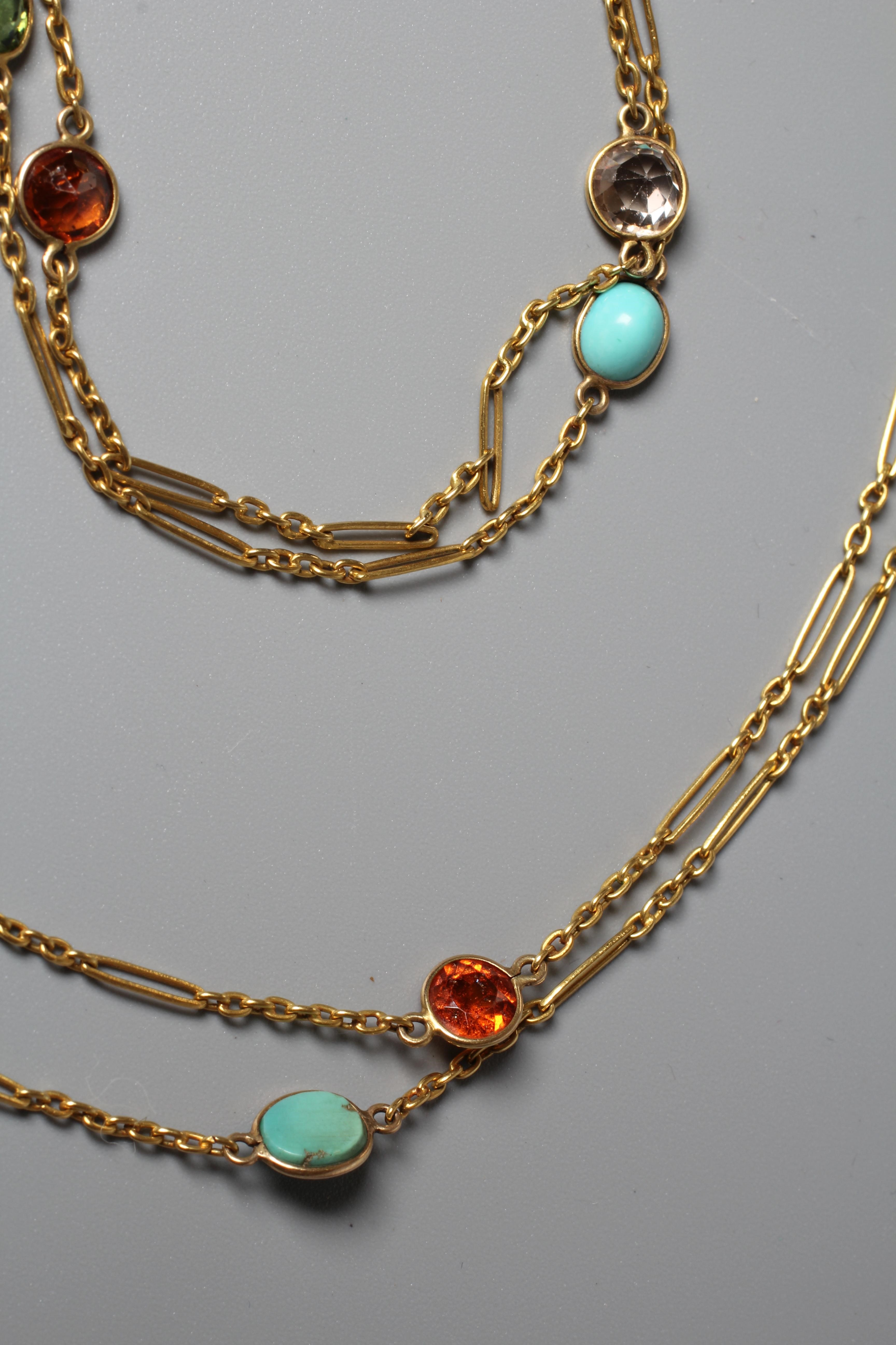AN EDWARDIAN FETTER LINK GUARD CHAIN, unmarked with dog clip fastener, collet set with numerous Image