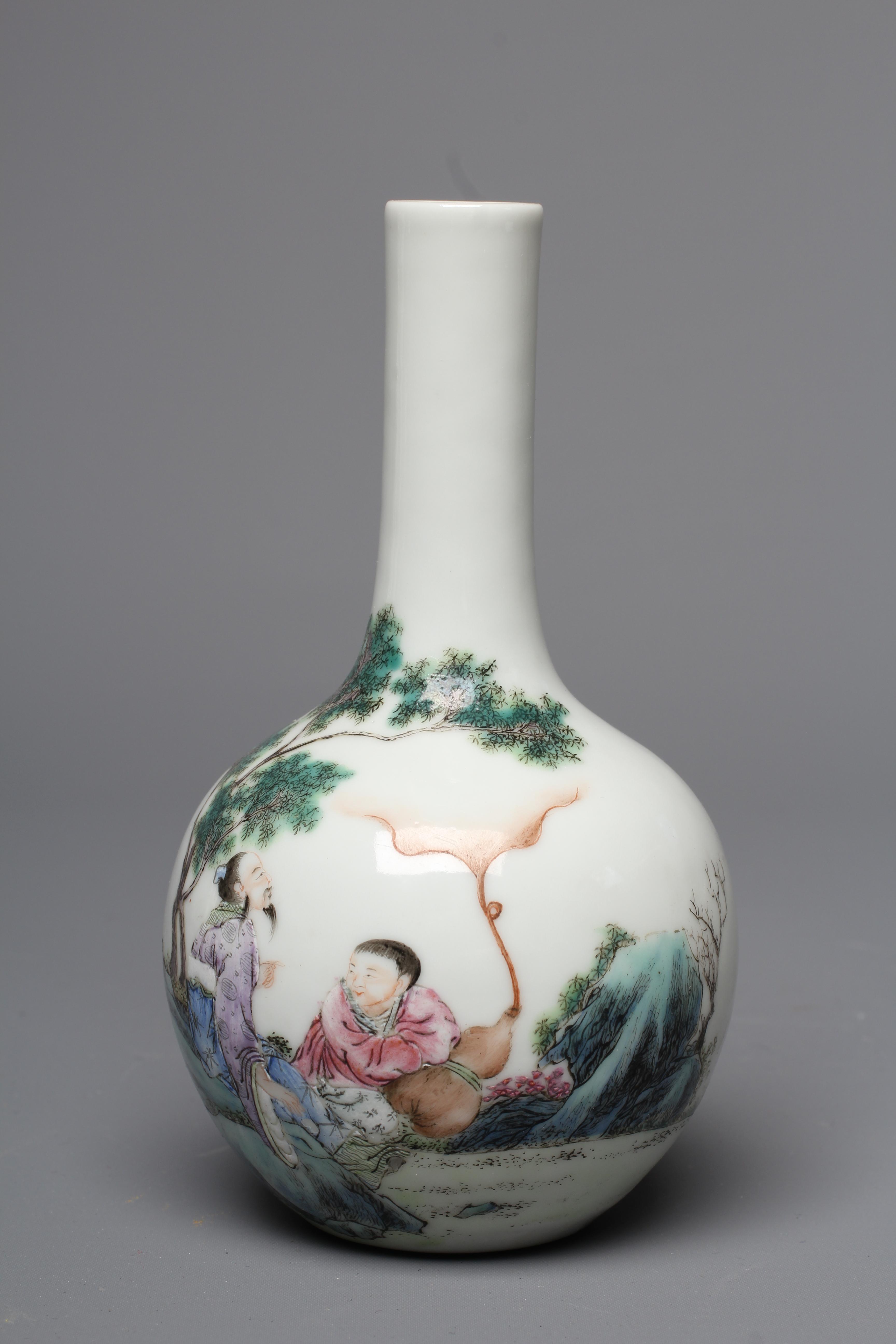 A CHINESE PORCELAIN SMALL BOTTLE VASE painted in coloured enamels with two figures seated beneath Image