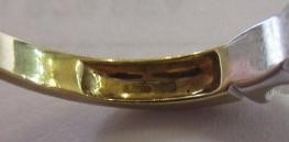 A SEVEN STONE DIAMOND HALF HOOP RING, the graduated round brilliants point set to a plain 18ct gold Image