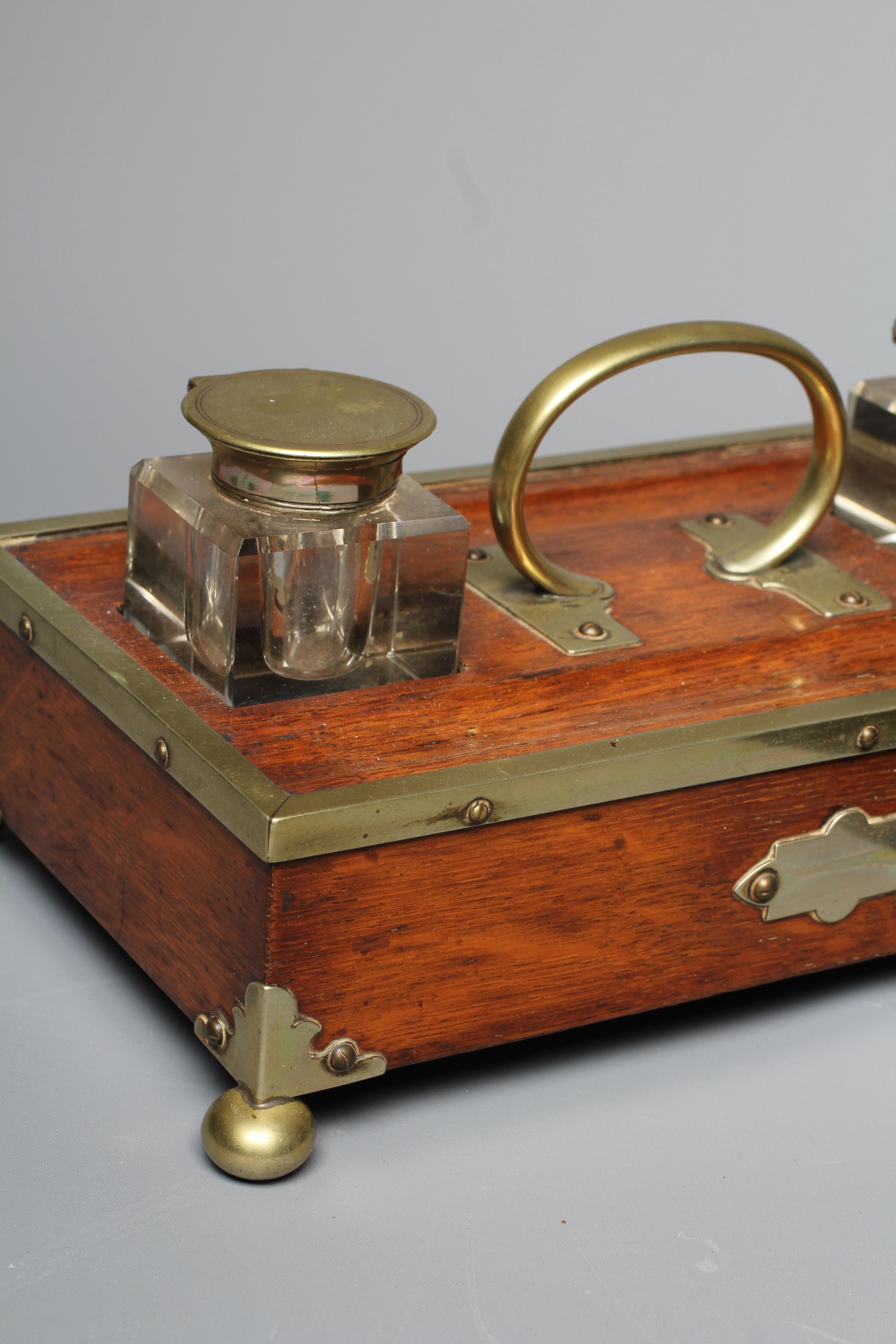 A VICTORIAN COROMANDEL DOMED STATIONERY CASKET with ornate brass and ivory Gothic revival mounts and Image