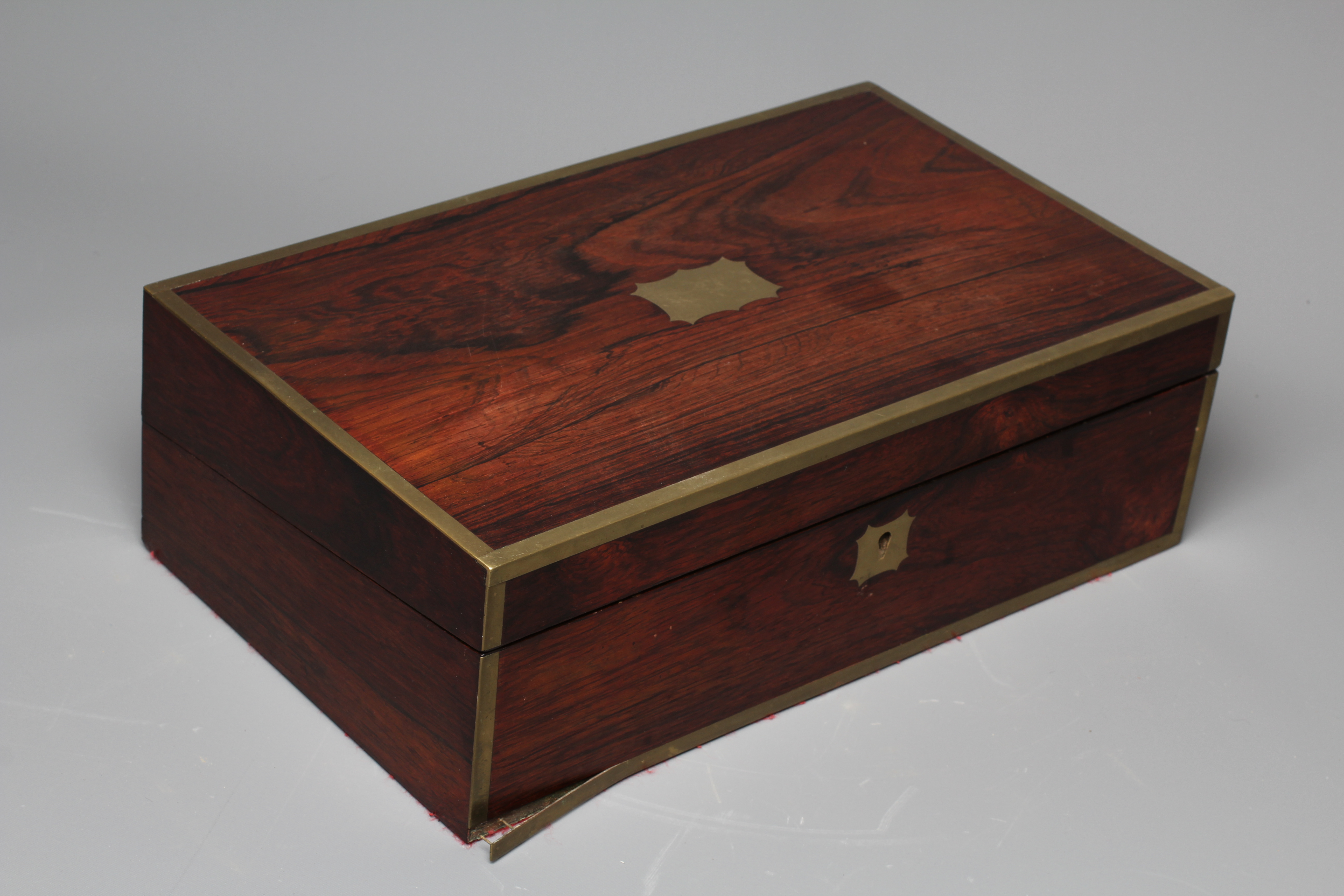 A 19TH CENTURY ROSEWOOD AND BRASS BOUND OBLONG WRITING SLOPE Image