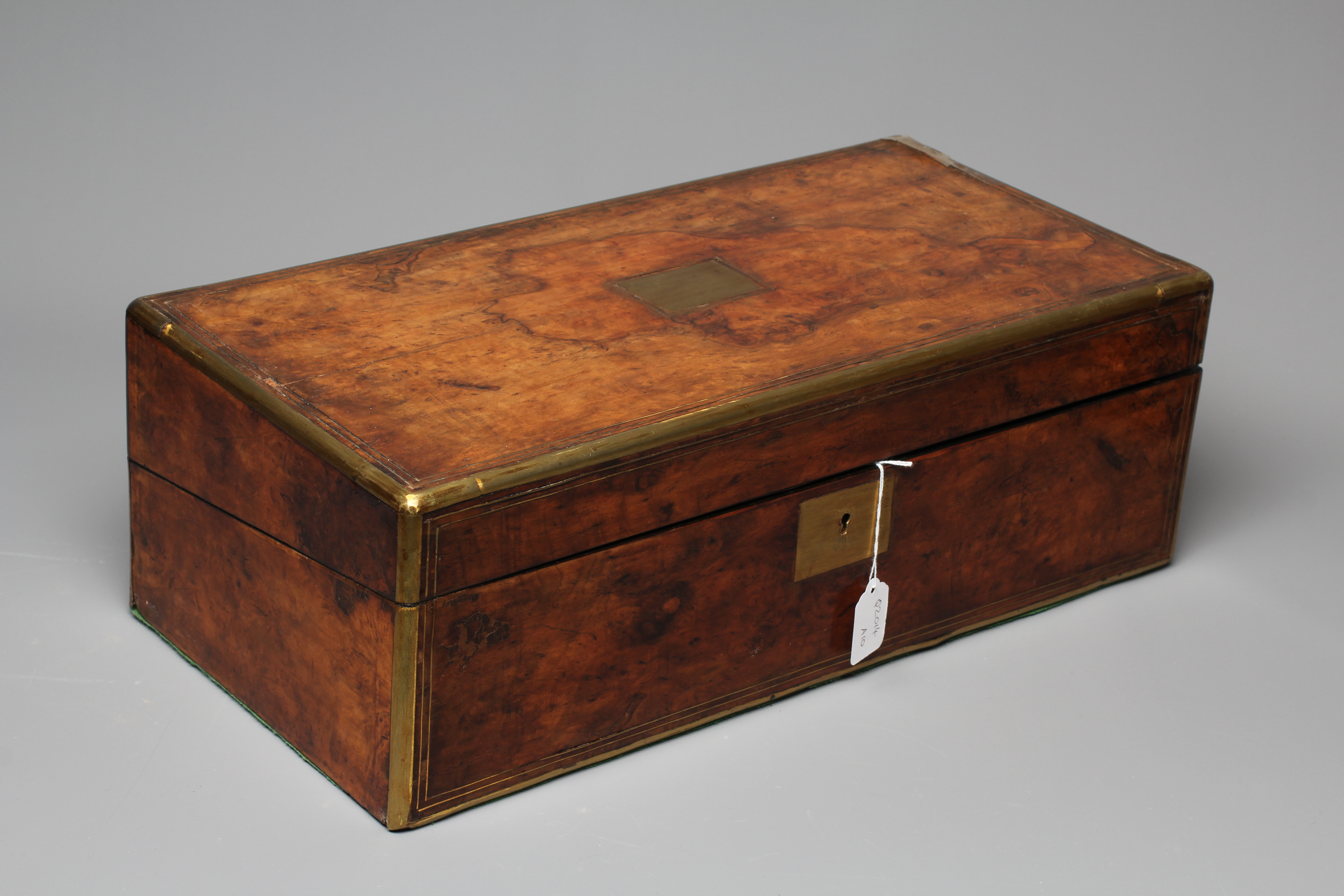 A SUBSTANTIAL LATE VICTORIAN WALNUT AND BRASS BOUND OBLONG WRITING SLOPE Image