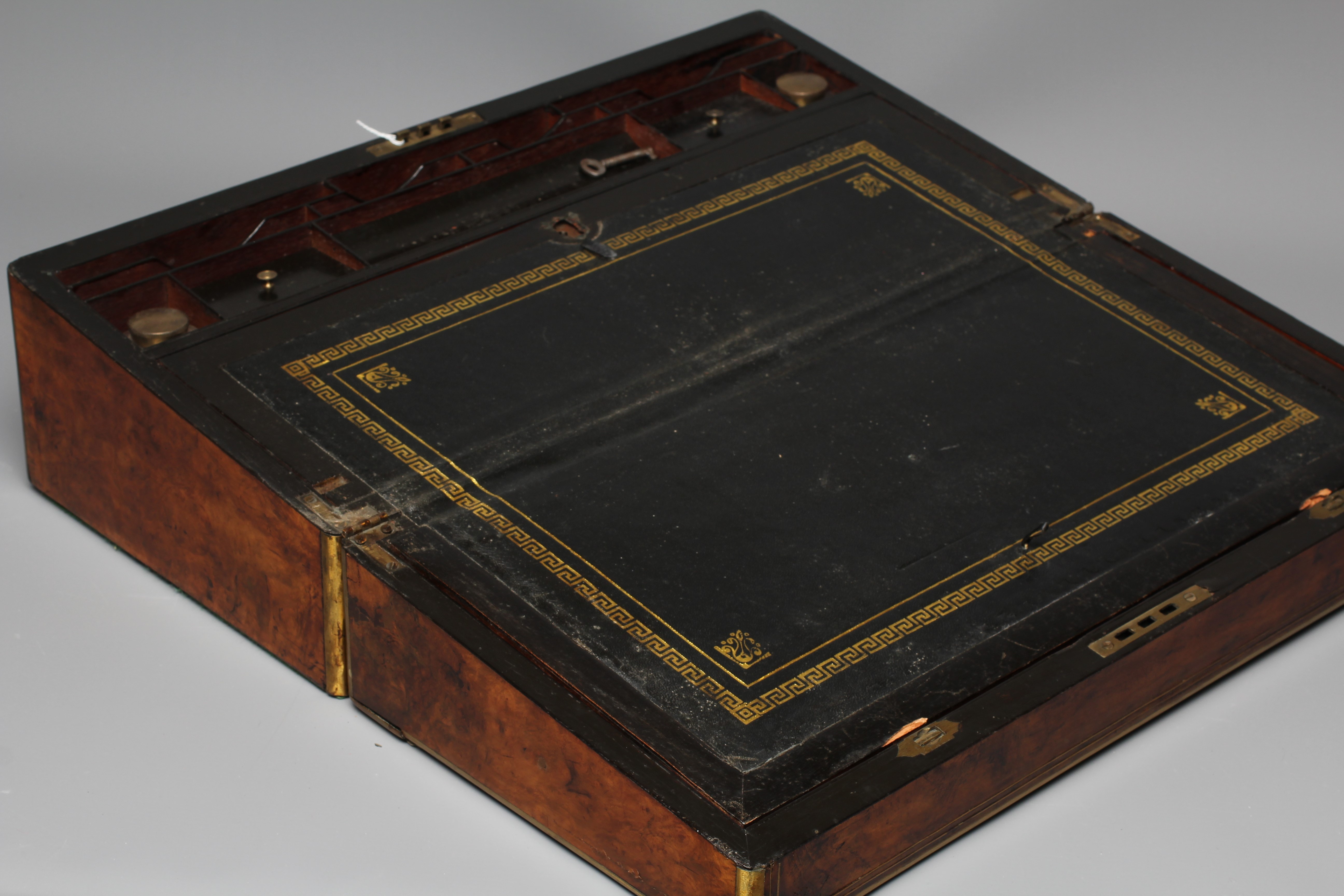 A SUBSTANTIAL LATE VICTORIAN WALNUT AND BRASS BOUND OBLONG WRITING SLOPE Image