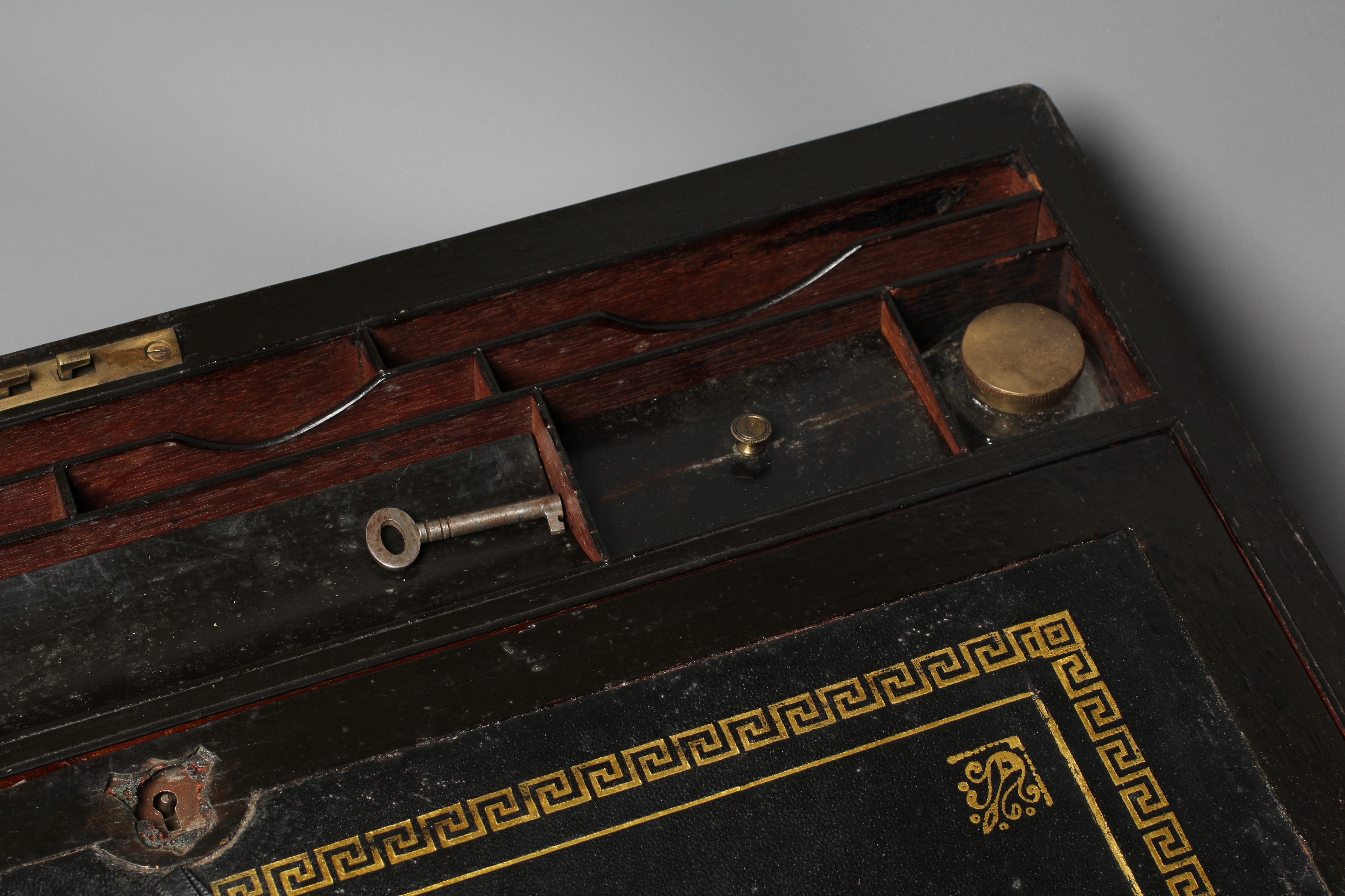 A SUBSTANTIAL LATE VICTORIAN WALNUT AND BRASS BOUND OBLONG WRITING SLOPE Image
