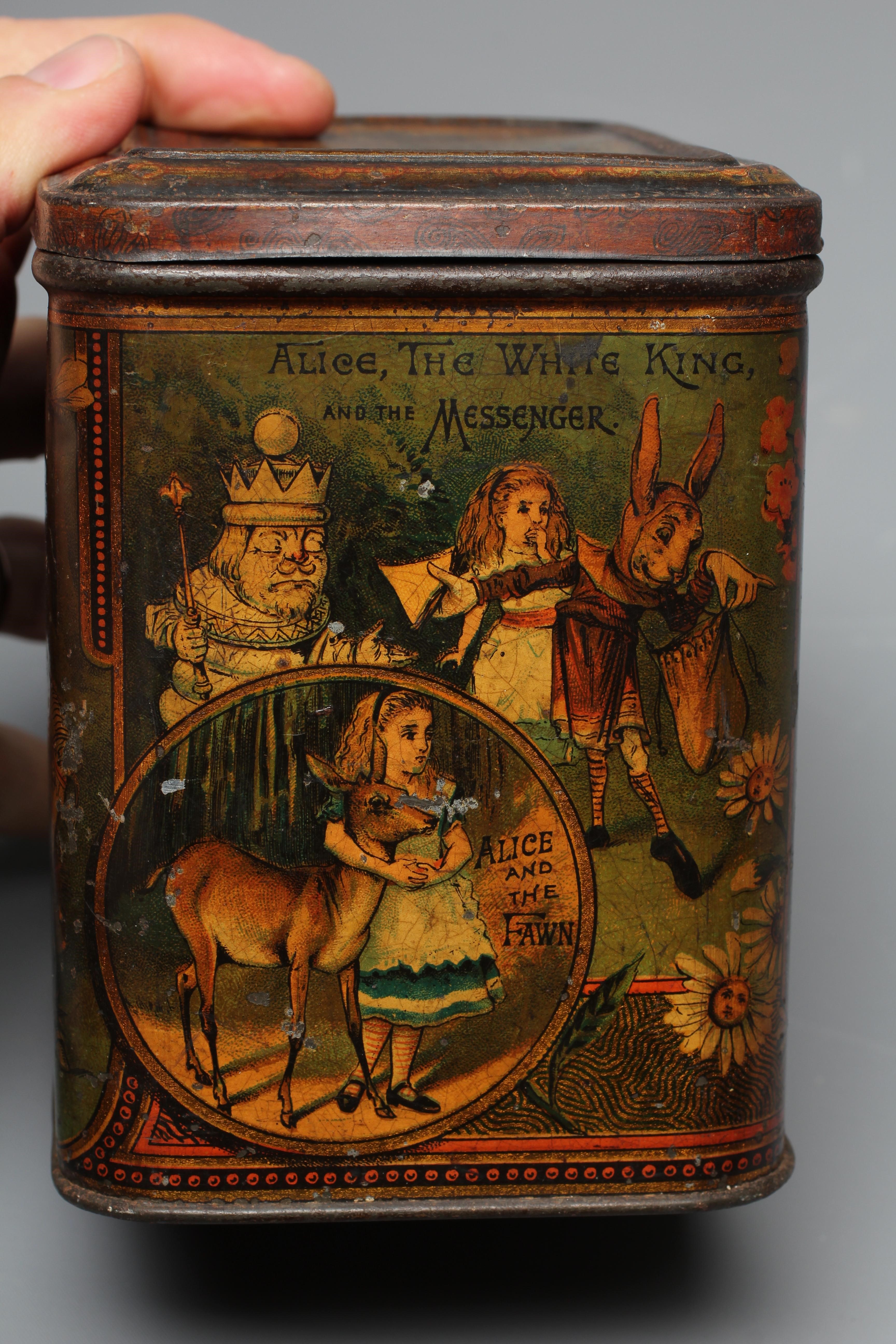 A VICTORIAN 'ALICE IN WONDERLAND' BISCUIT TIN BY W & R JACOBS LTD. of rounded oblong form Image