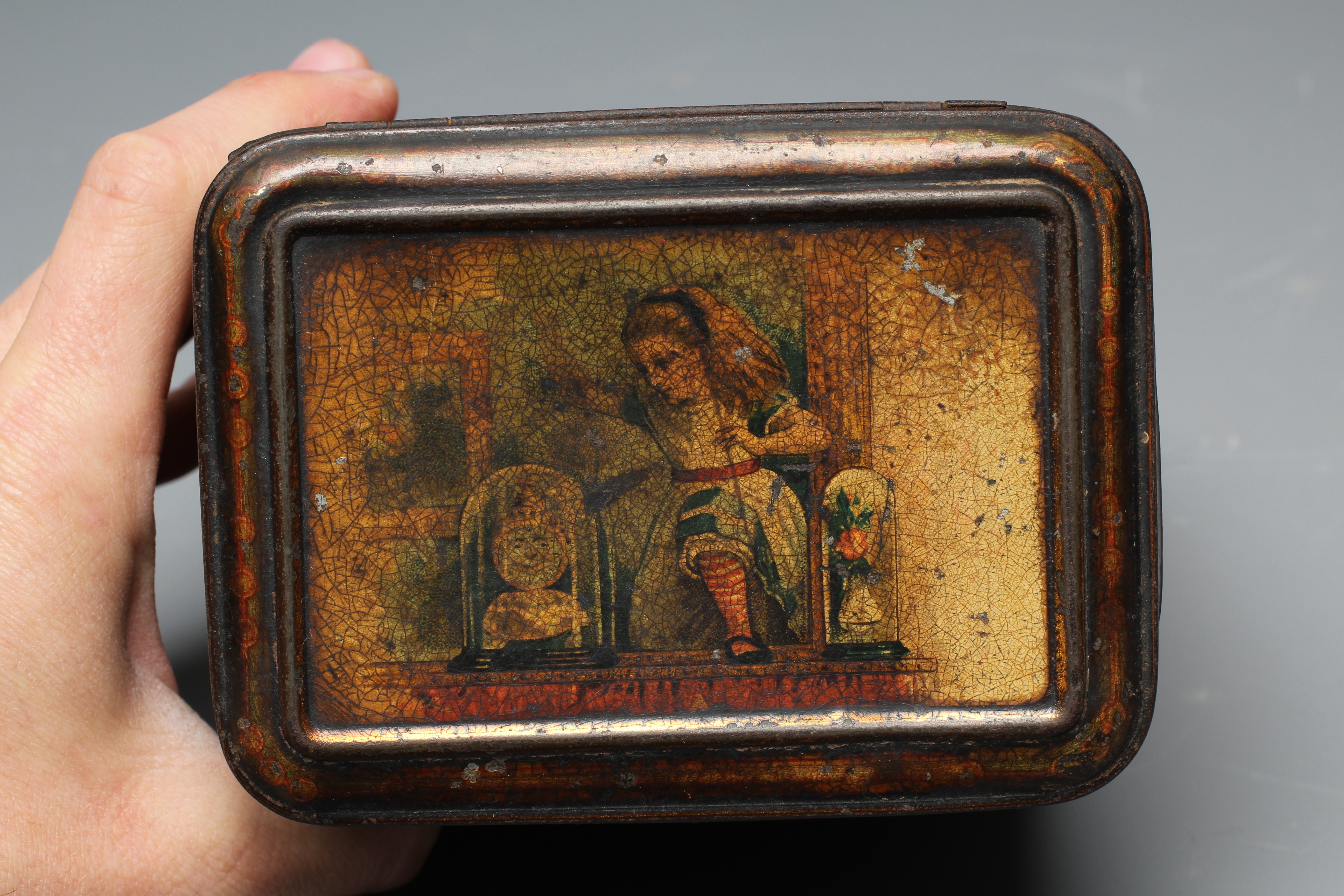 A VICTORIAN 'ALICE IN WONDERLAND' BISCUIT TIN BY W & R JACOBS LTD. of rounded oblong form Image