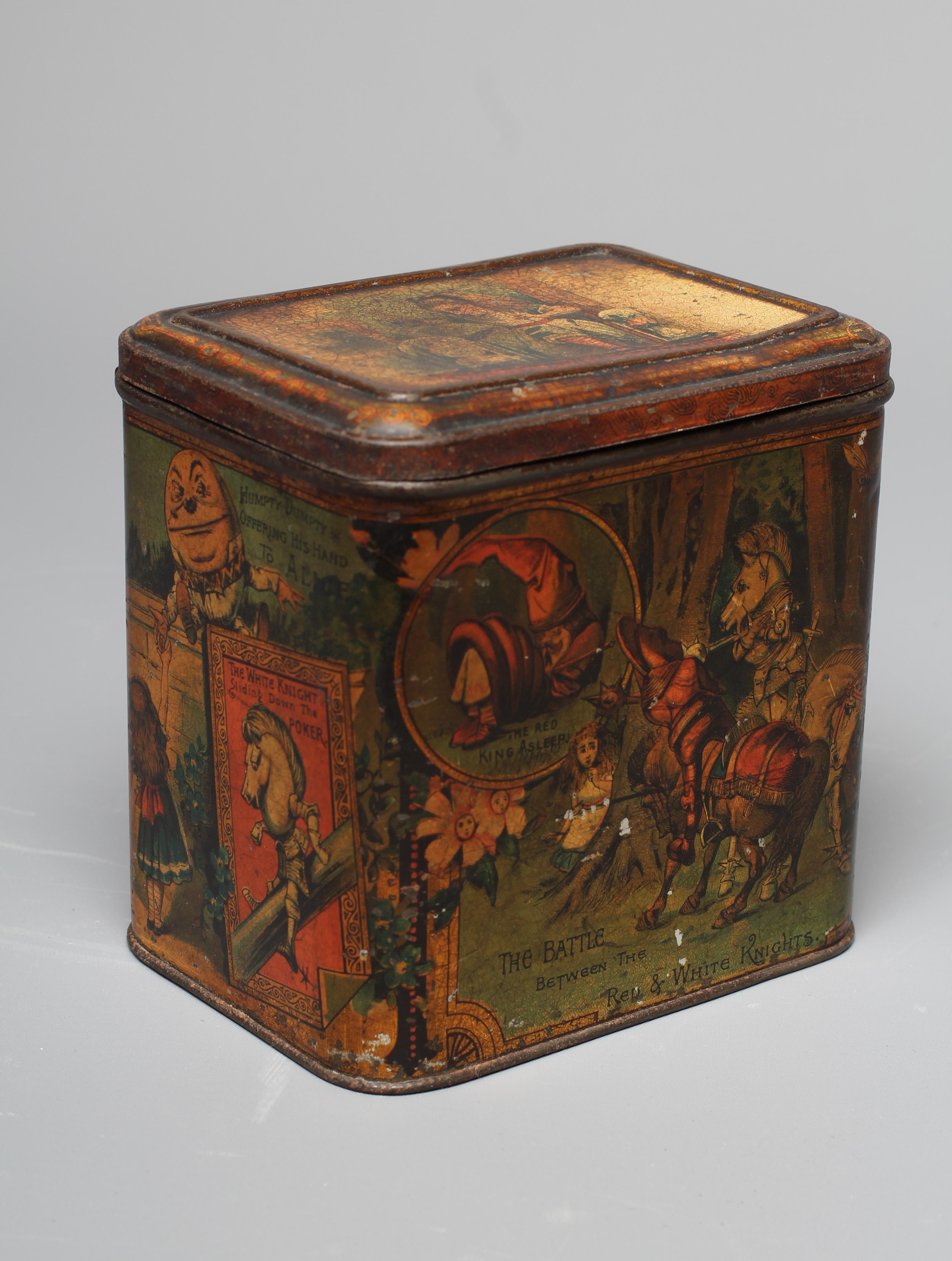 A VICTORIAN 'ALICE IN WONDERLAND' BISCUIT TIN BY W & R JACOBS LTD. of rounded oblong form Image