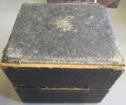 A CRYSTAL BALL, early 20th century, in original silk and velvet lined case, retailed by Two Worlds Image