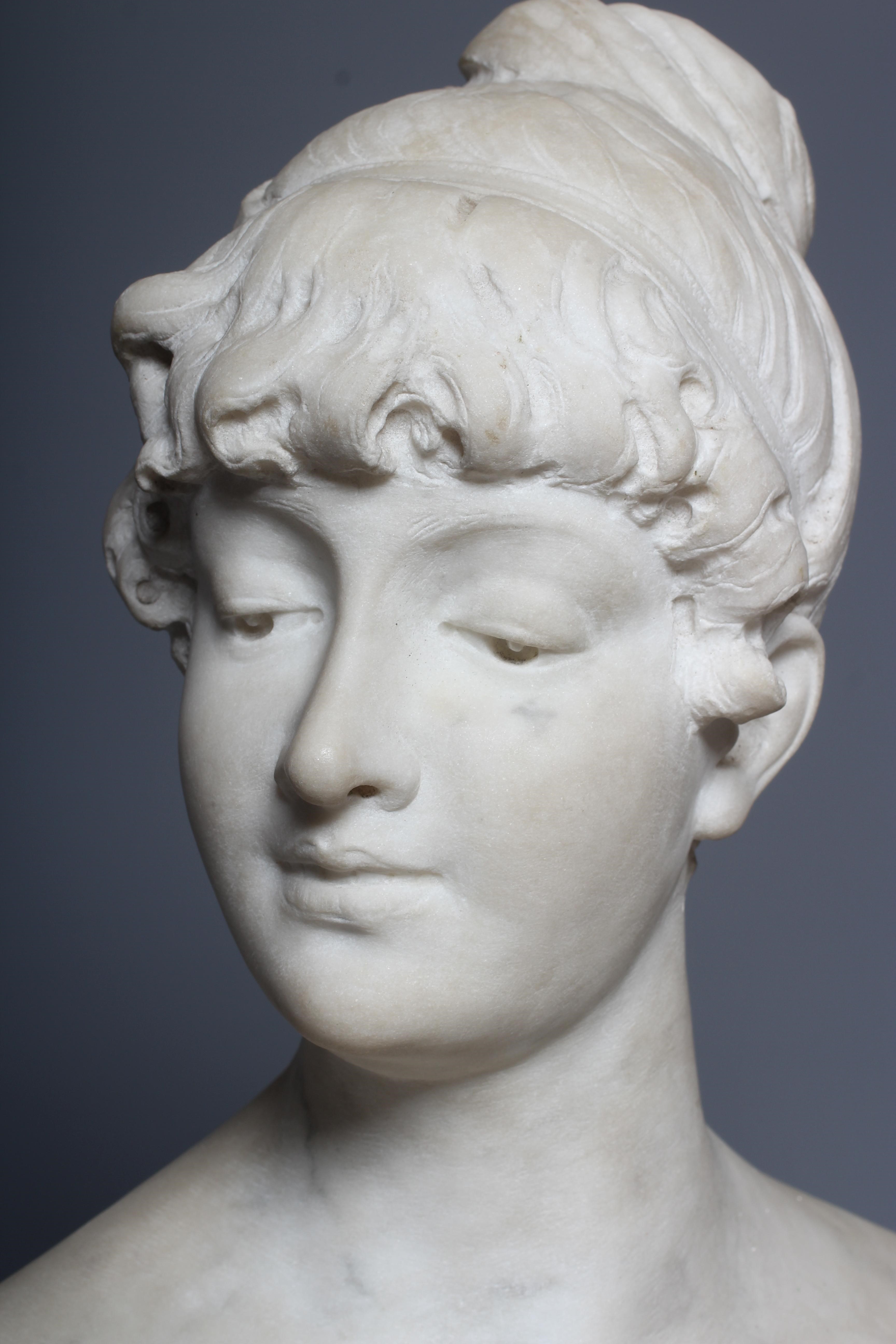 A LATE 19TH CENTURY CARVED CARRARA MARBLE BUST OF A LADY in the antique style Image