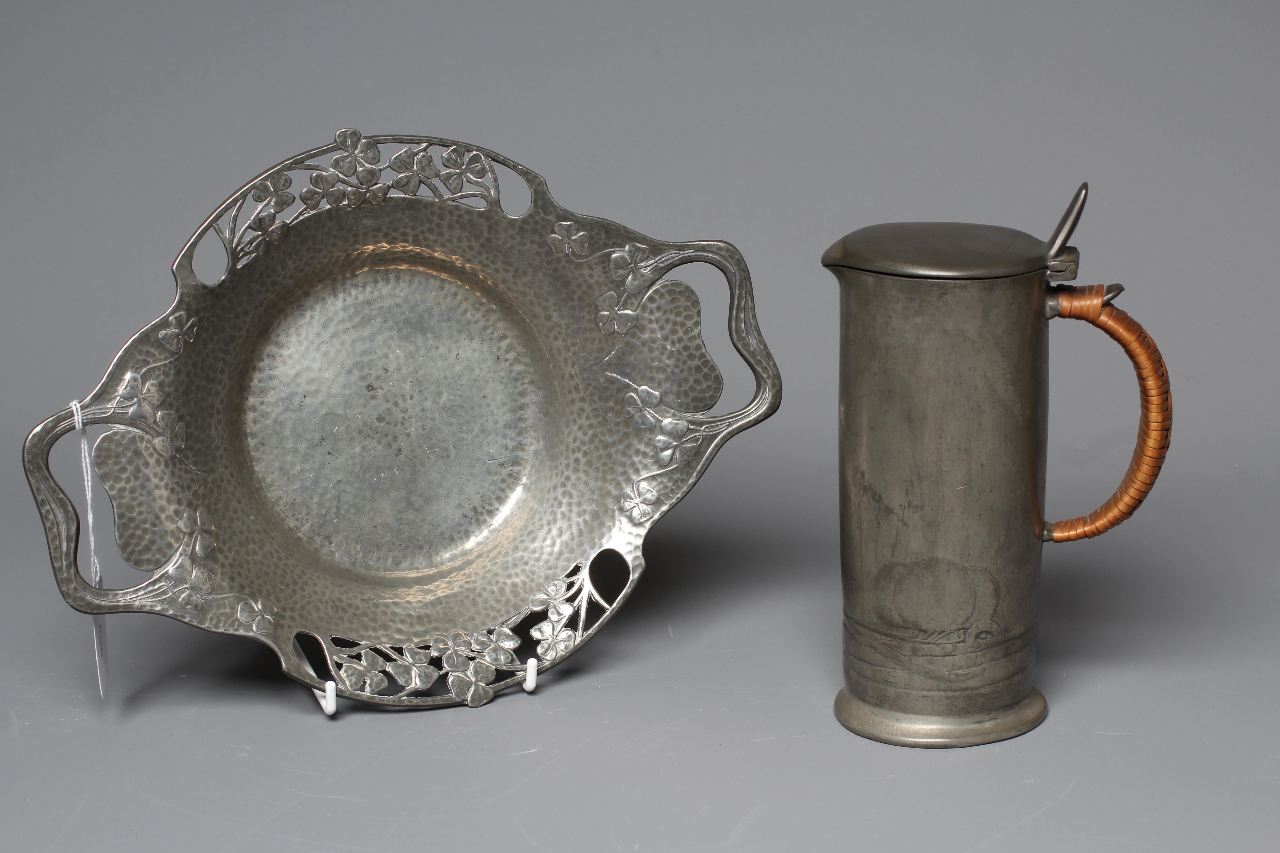 ARCHIBALD KNOX FOR LIBERTY & CO. - An English Pewter tankard of plain cylindrical form Image