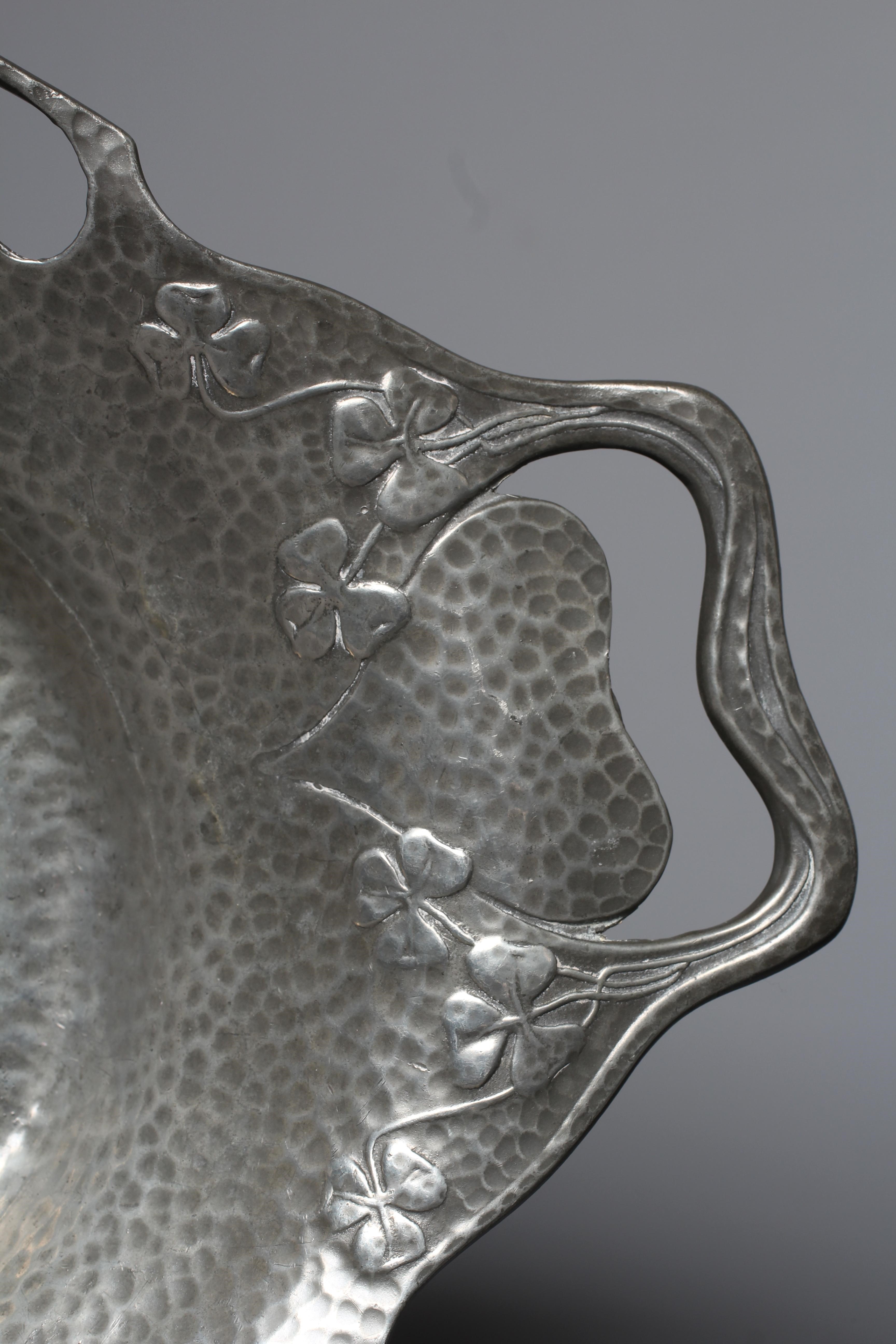 ARCHIBALD KNOX FOR LIBERTY & CO. - An English Pewter tankard of plain cylindrical form Image