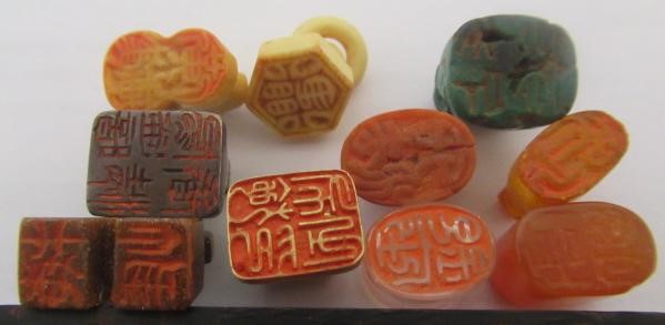 A SET OF TEN CHINESE MINIATURE SEALS including cornelian Image