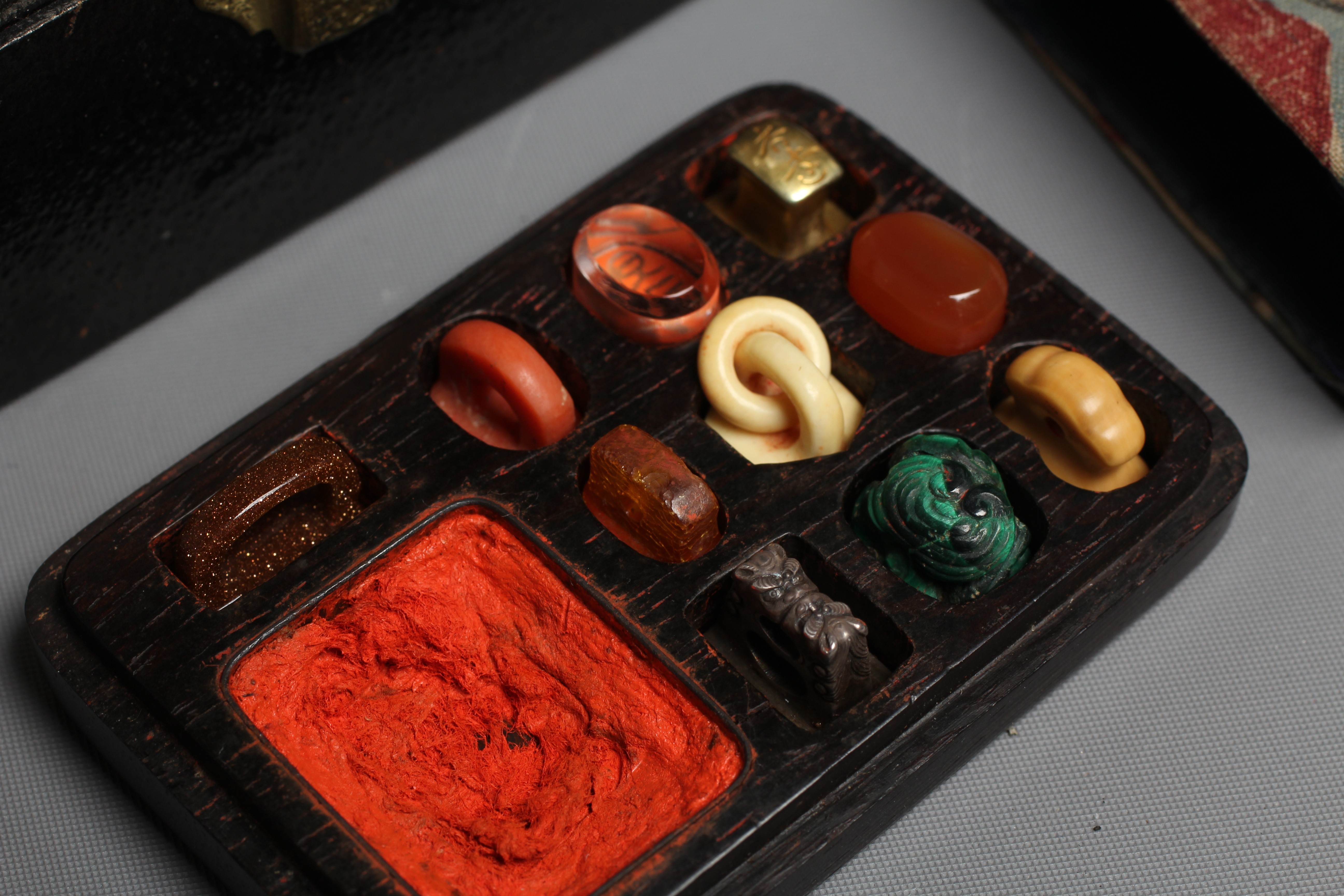 A SET OF TEN CHINESE MINIATURE SEALS including cornelian Image