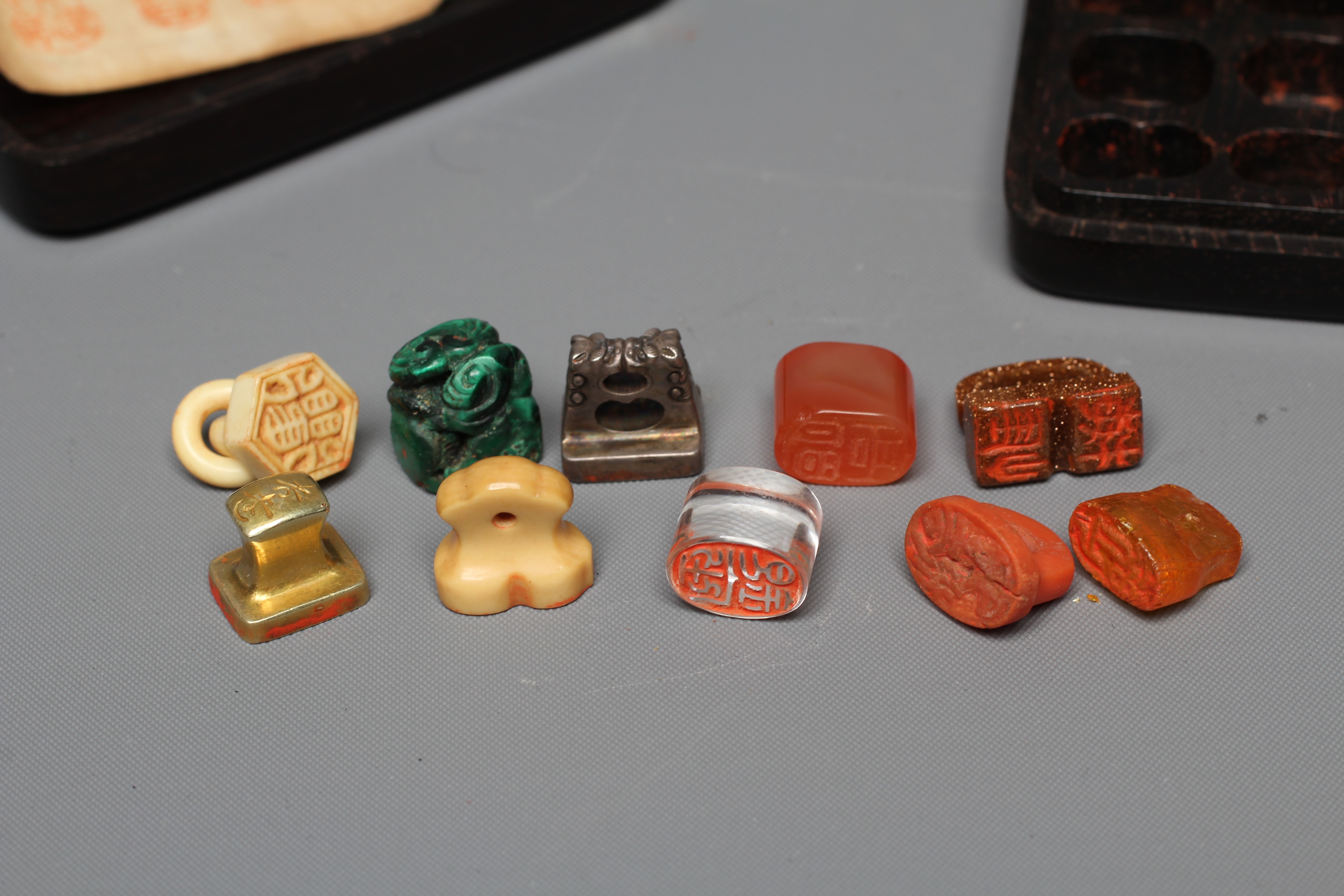 A SET OF TEN CHINESE MINIATURE SEALS including cornelian Image