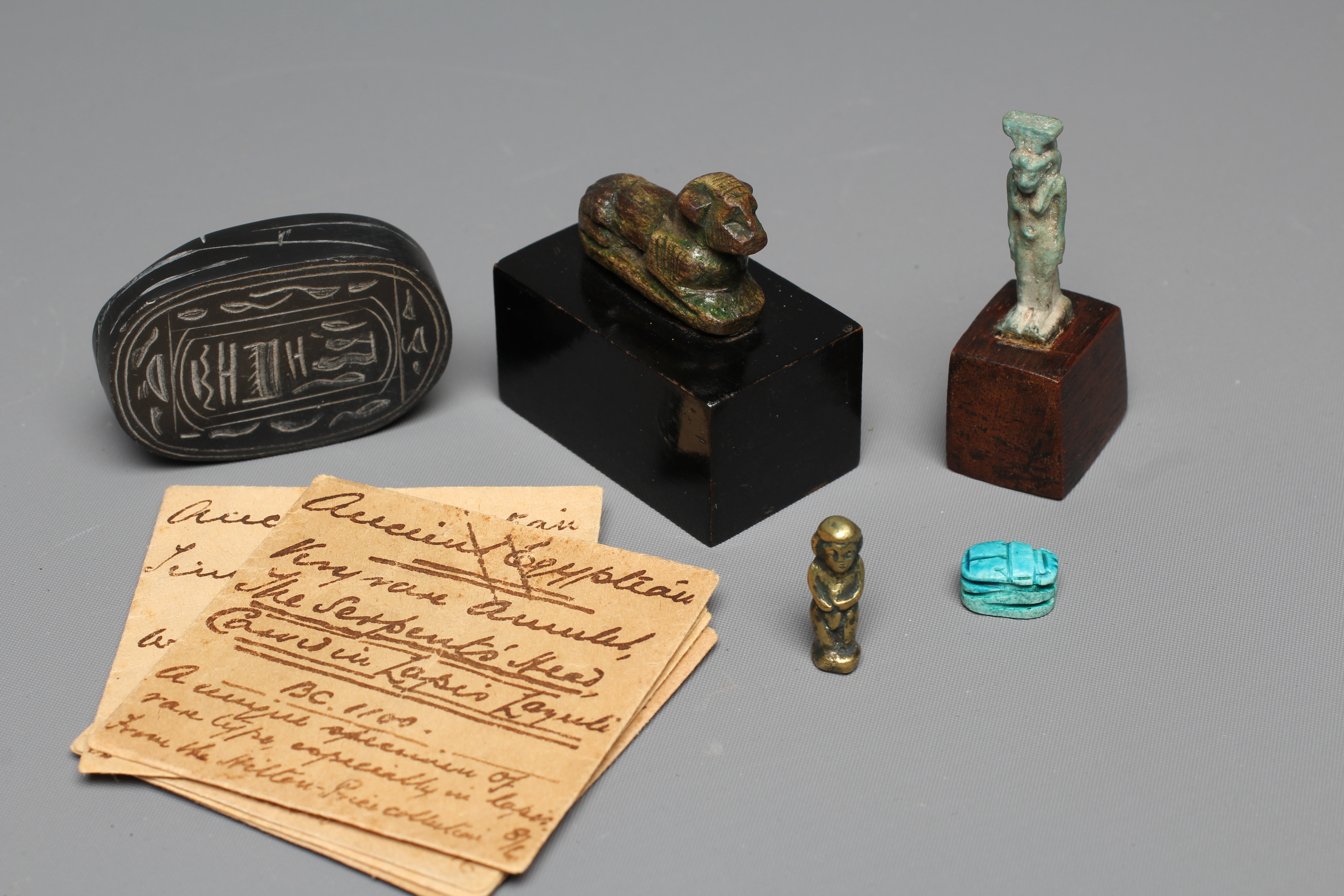 FIVE ANCIENT EGYPTIAN MINIATURES all with handwritten descriptions to small brown envelopes Image