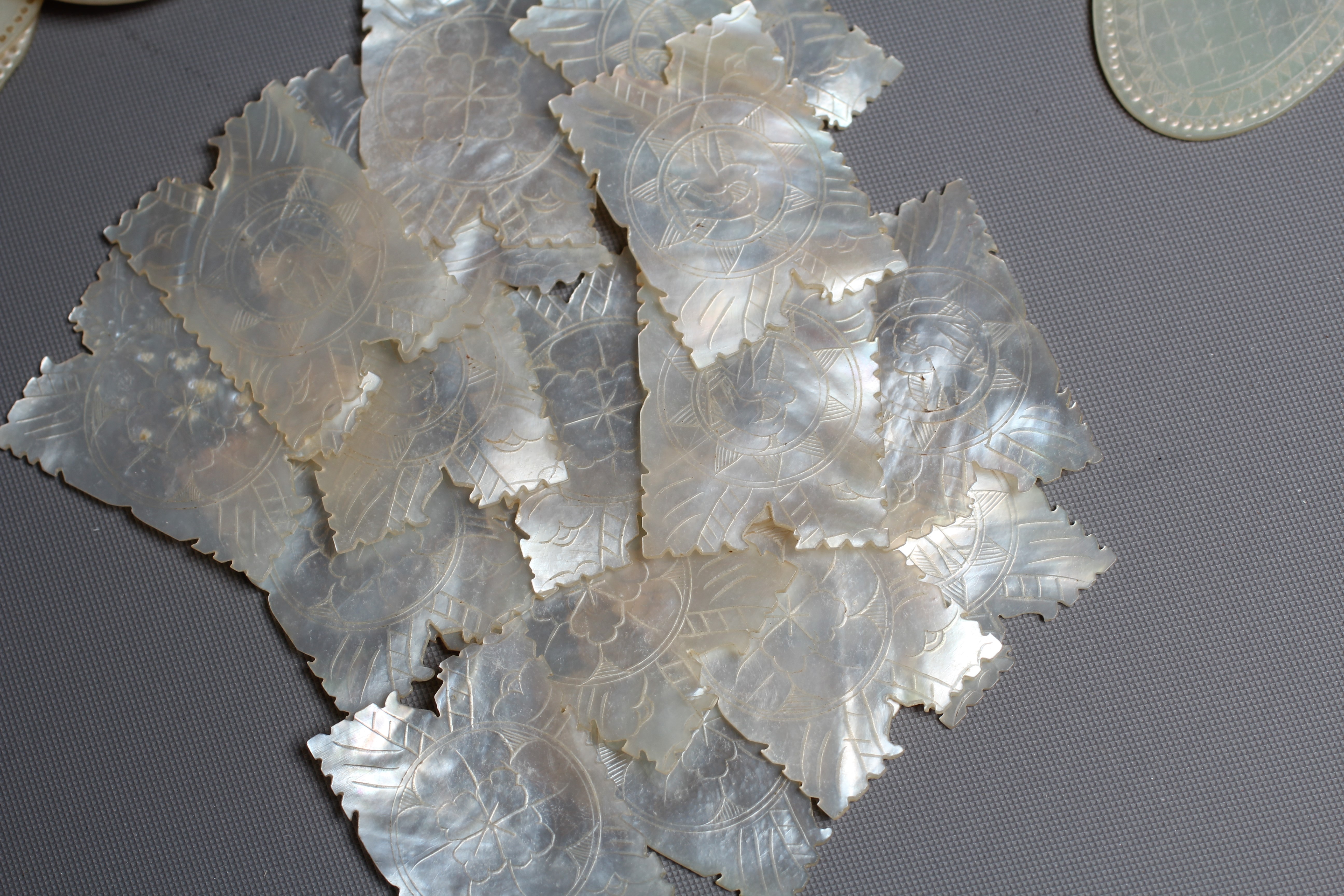 A COLLECTION OF CHINESE MOTHER-OF-PEARL GAMING COUNTERS Image
