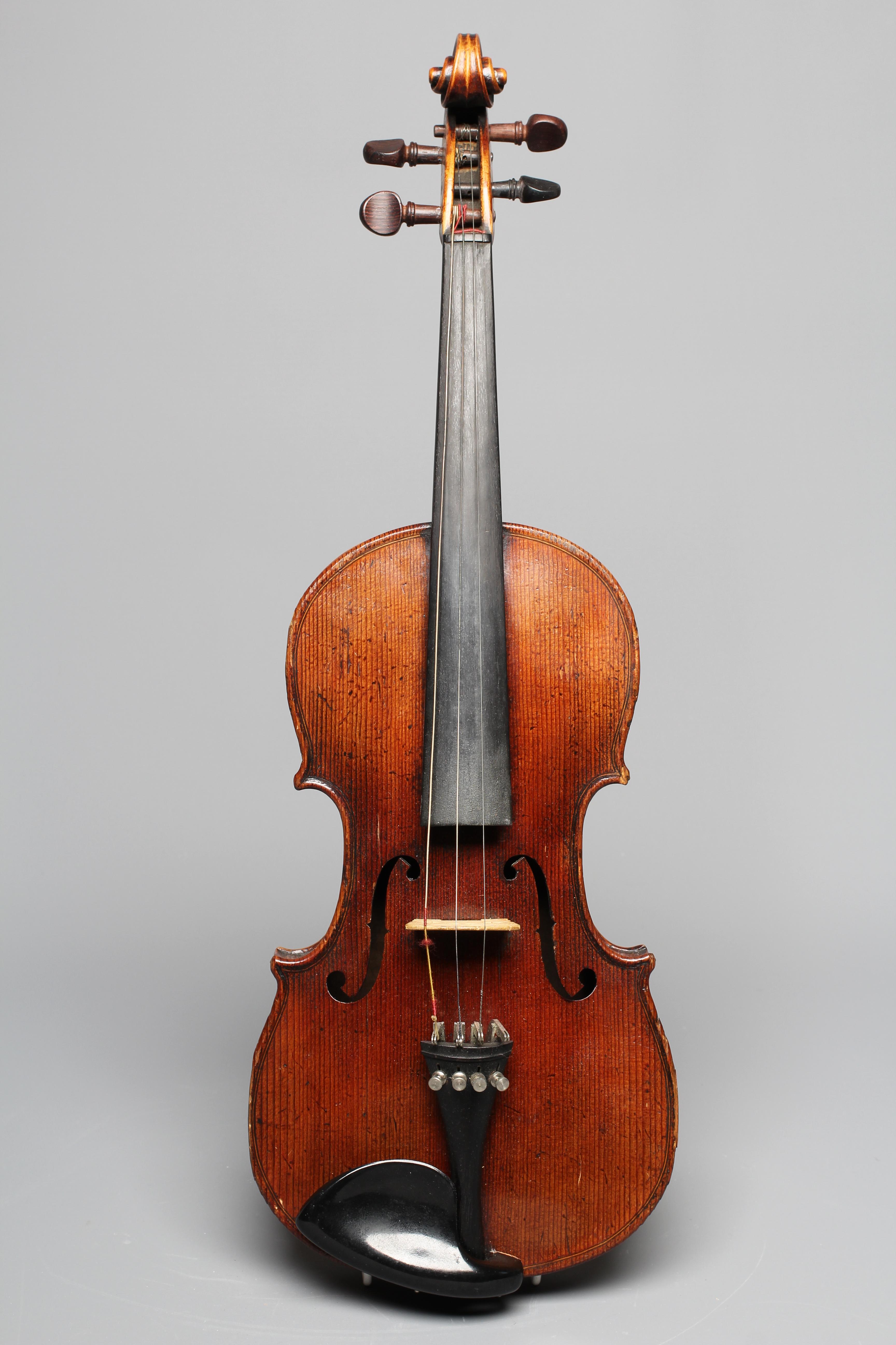 A LATE 19TH CENTURY GERMAN VIOLIN with 13" two piece back and maple ribs Image