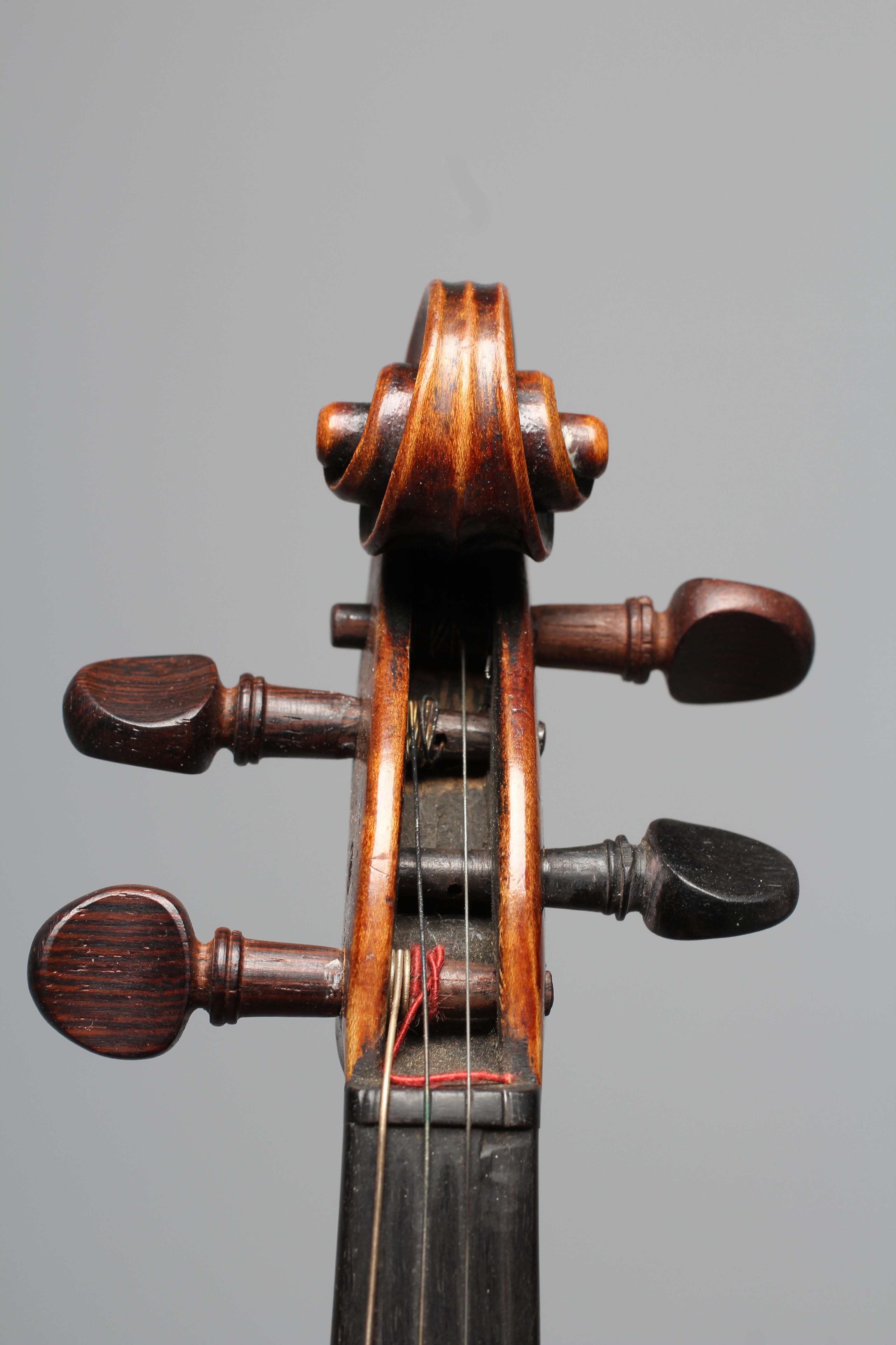 A LATE 19TH CENTURY GERMAN VIOLIN with 13" two piece back and maple ribs Image
