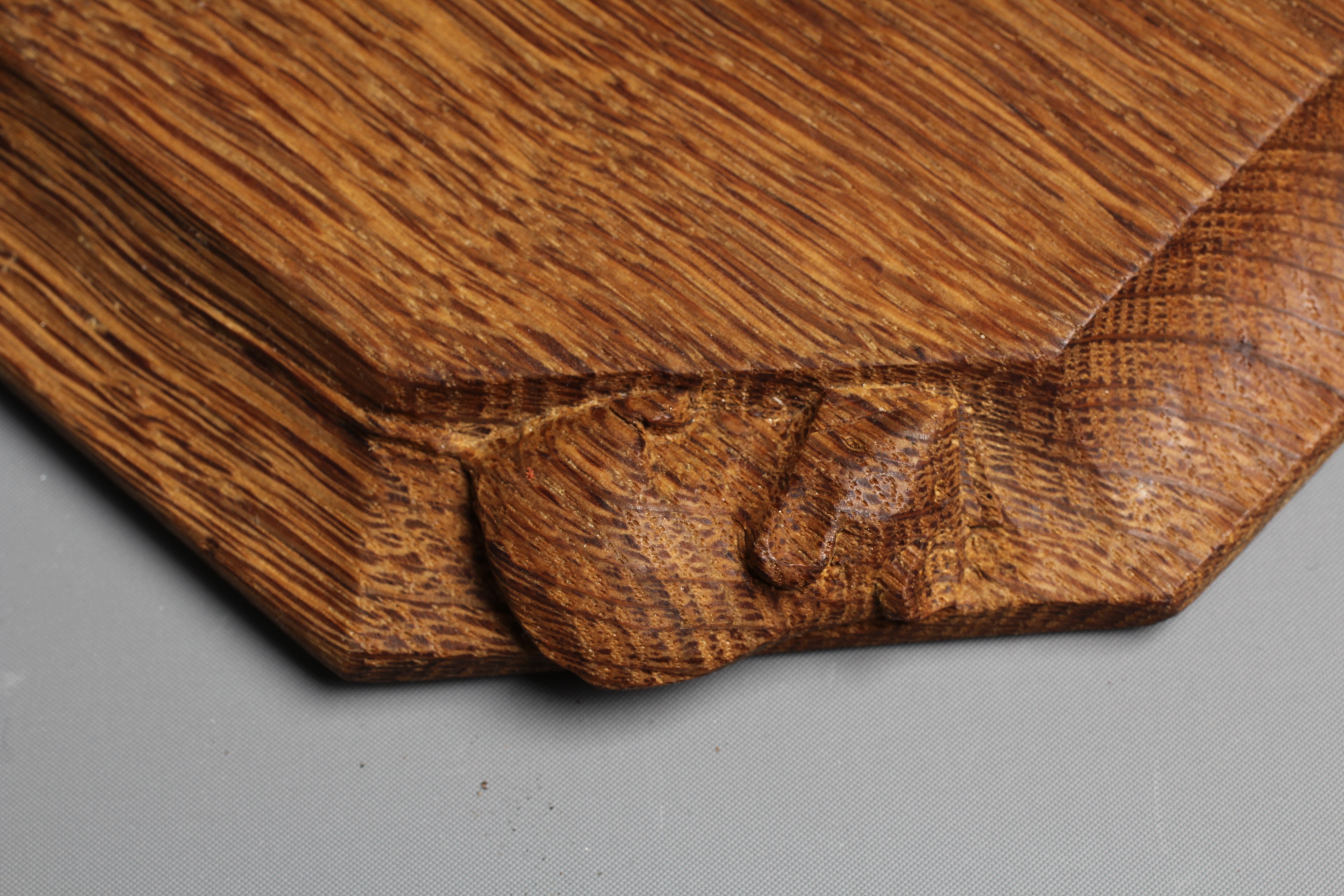 A ROBERT THOMPSON OCTAGONAL OAK TEAPOT STAND/SMALL CHOPPING BOARD with carved mouse trademark Image