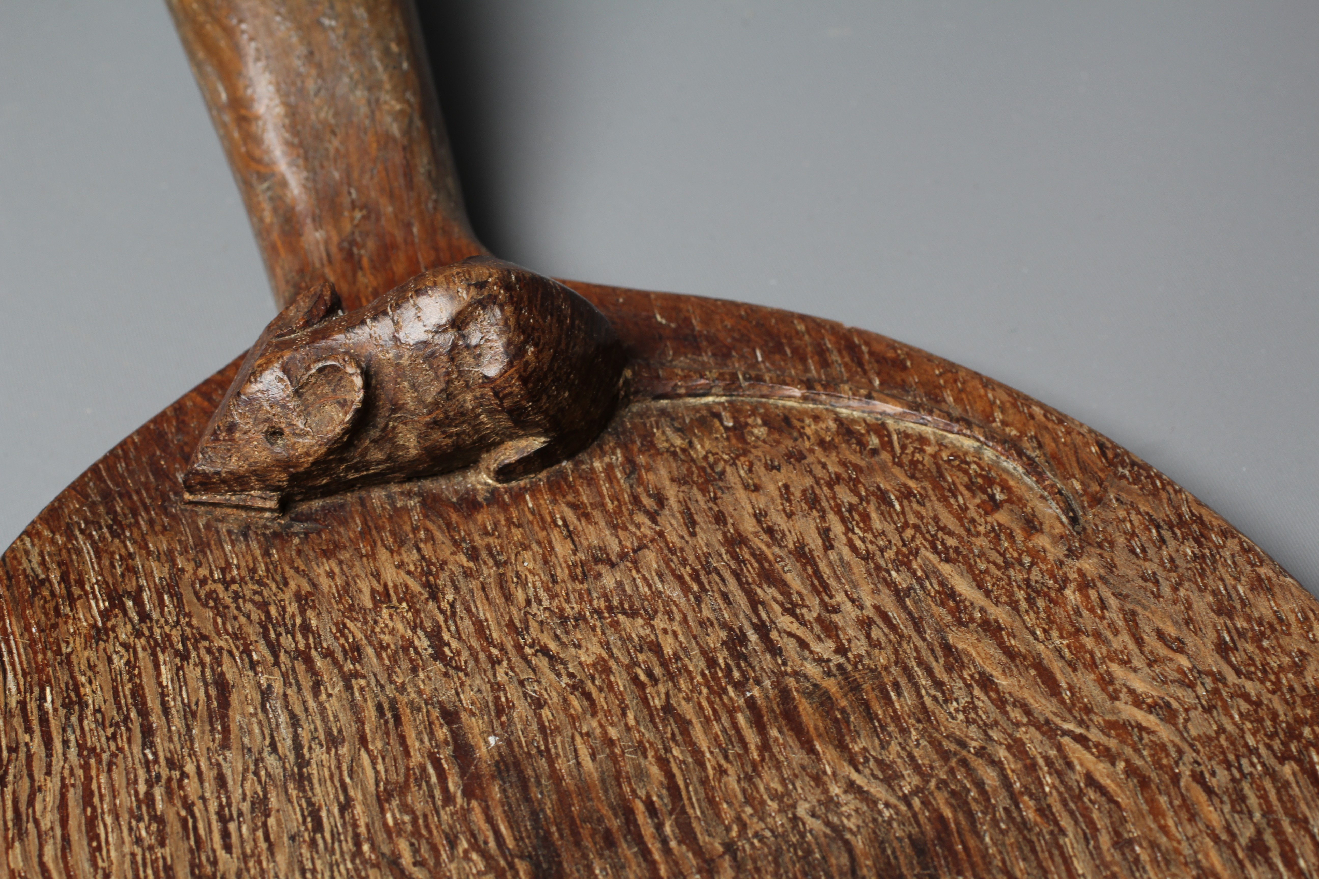 A ROBERT THOMPSON OAK CHEESE BOARD with carved mouse trademark to the handle, 14 3/4" Image